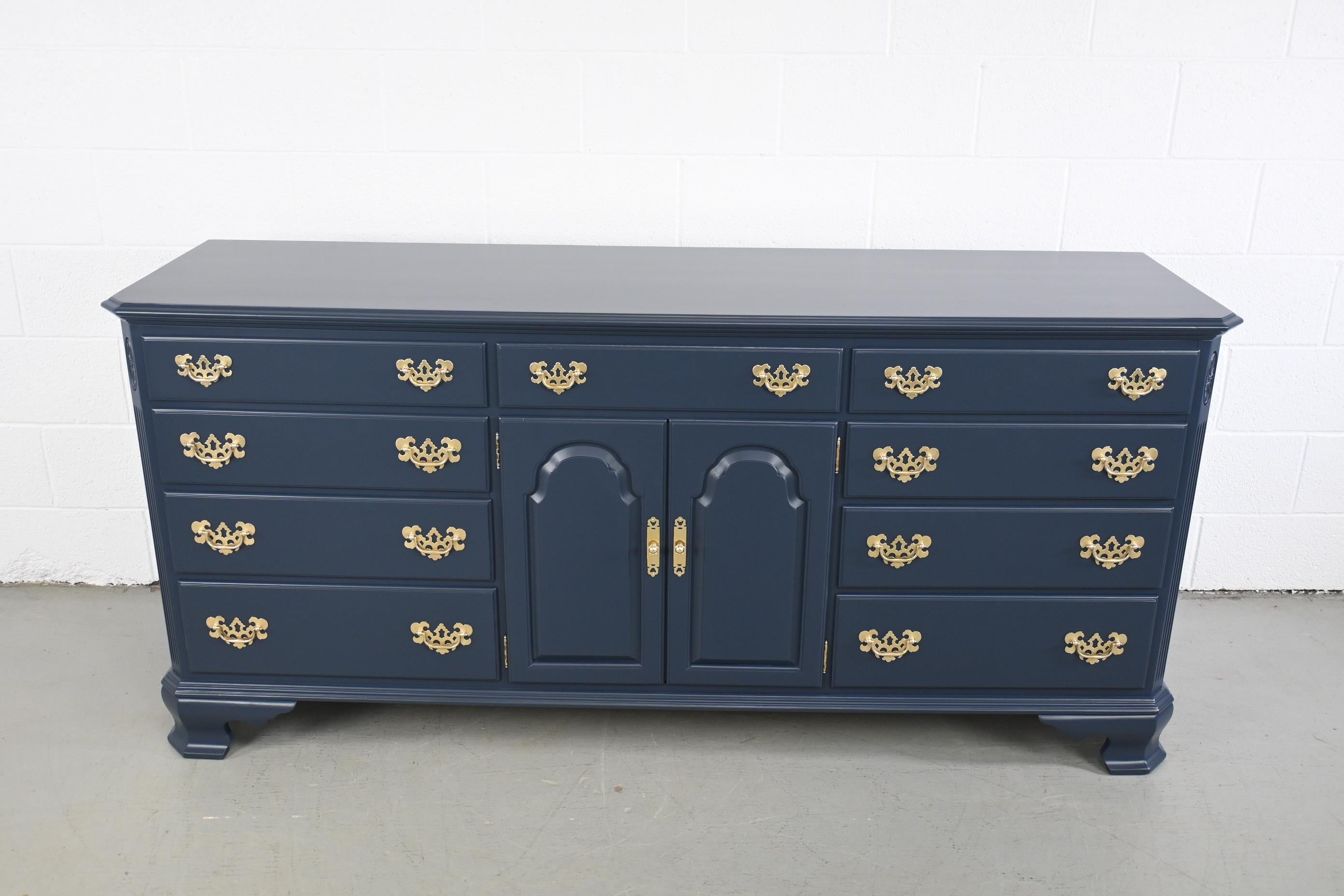 navy dresser with gold hardware