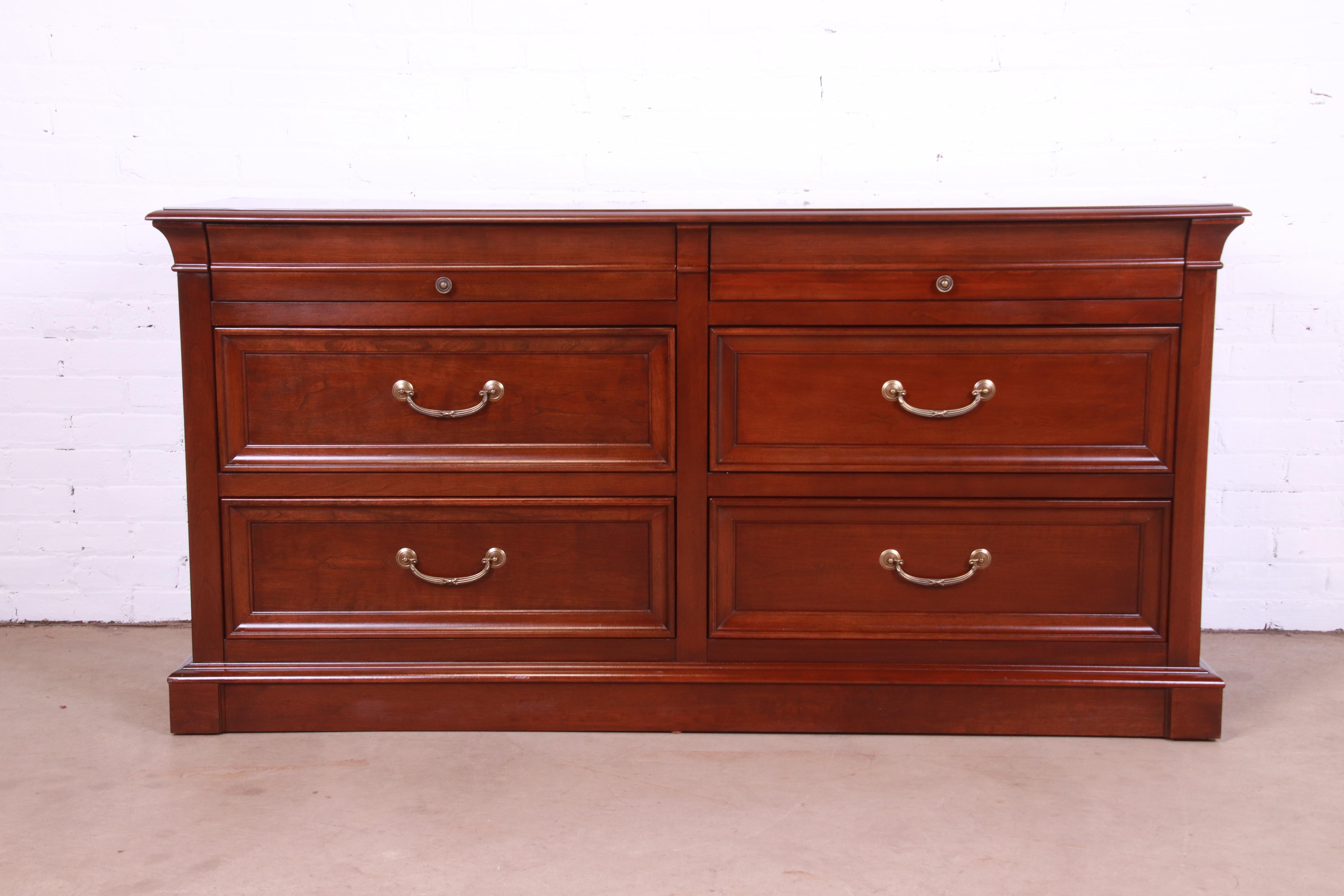 A gorgeous Georgian or Regency style six-drawer dresser or credenza

By Ethan Allen

USA, Circa 1990s

Cherry wood, with original brass hardware.

Measures: 64