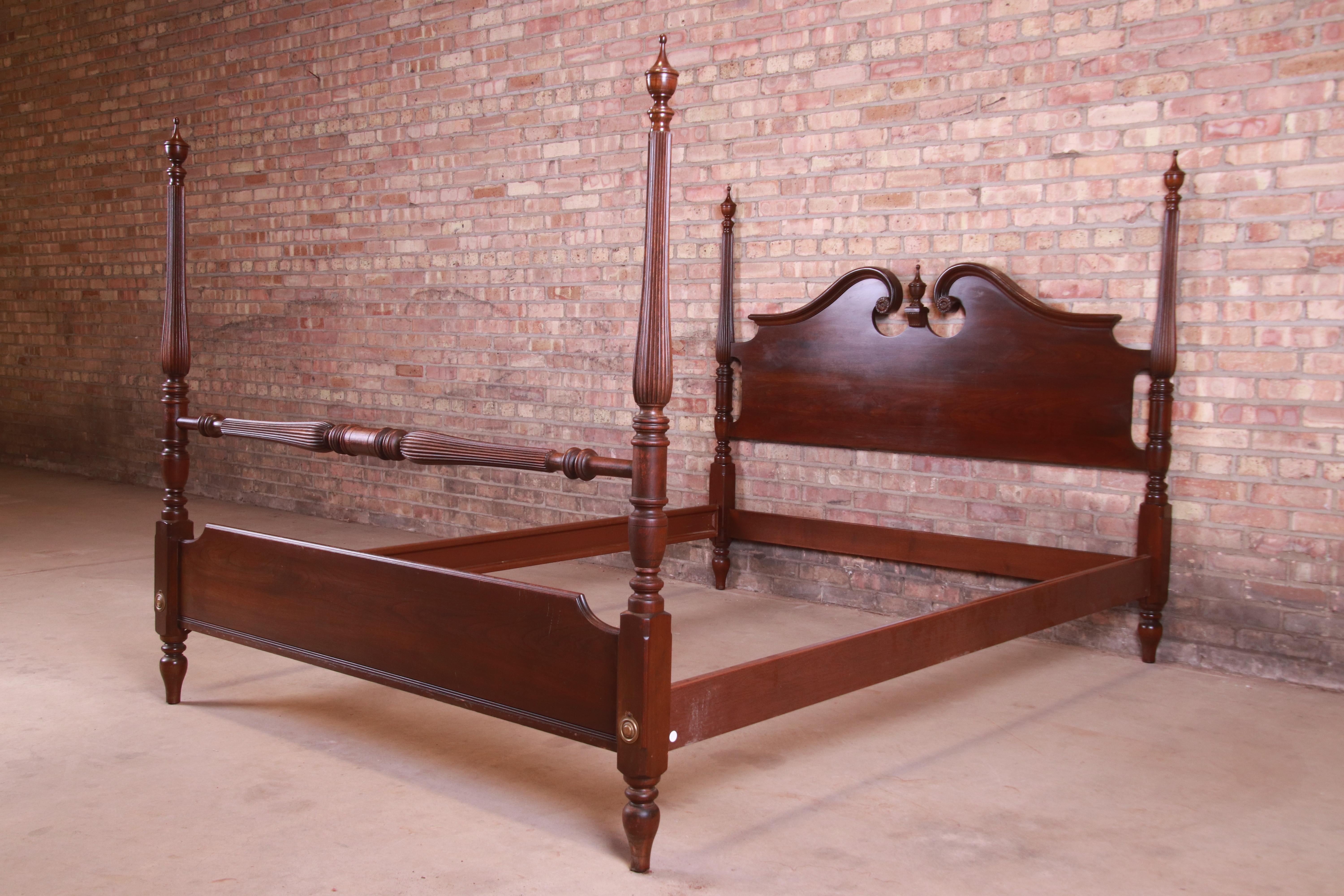 A gorgeous Georgian style carved mahogany four poster queen size bed frame

By Ethan Allen 