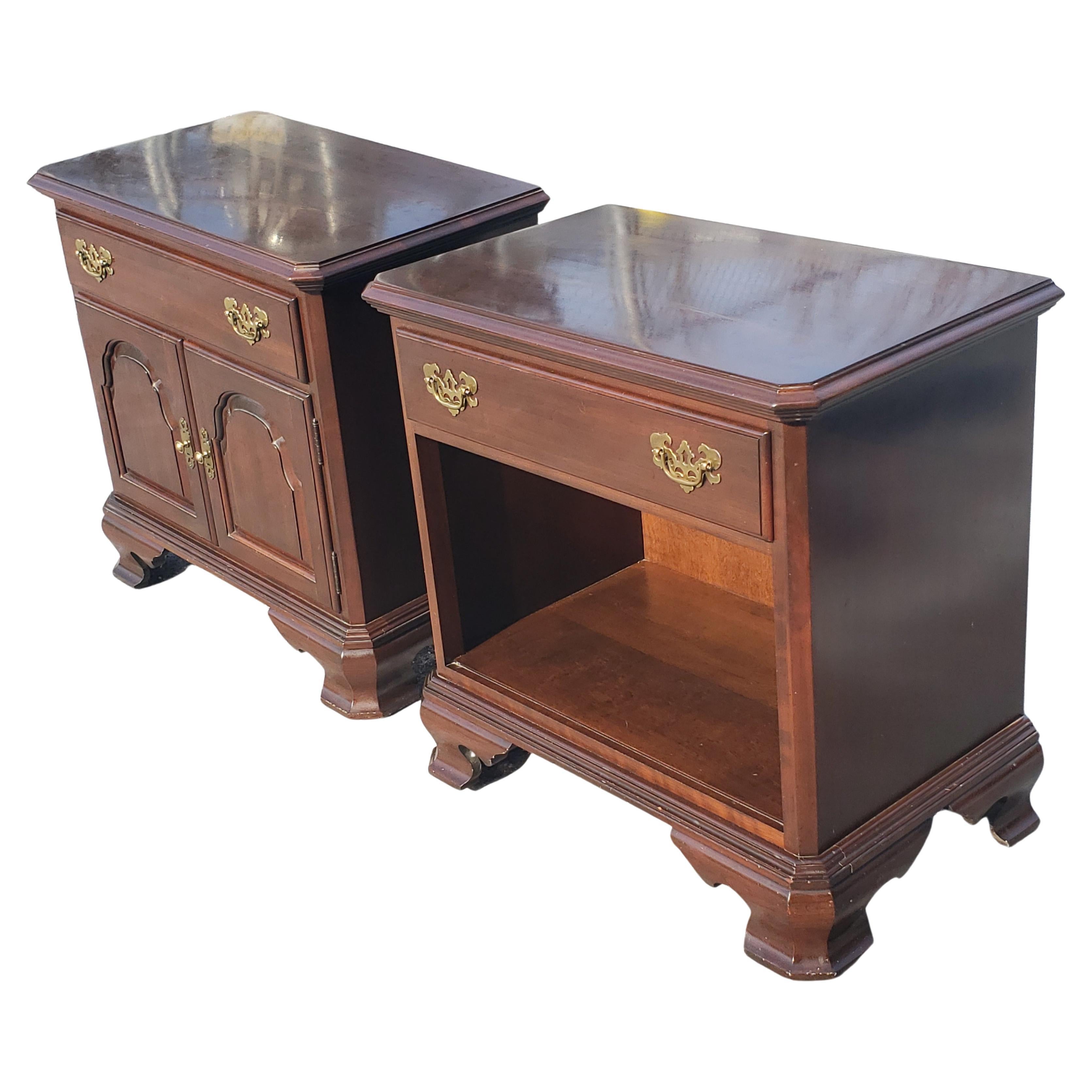 A pair Ethan Allen Georgian court side tables nightstands. 
Sorry Cherry construction with drop down brass handles. Good vintage Condition with normal wear. Some light scratches. 
Measures 27