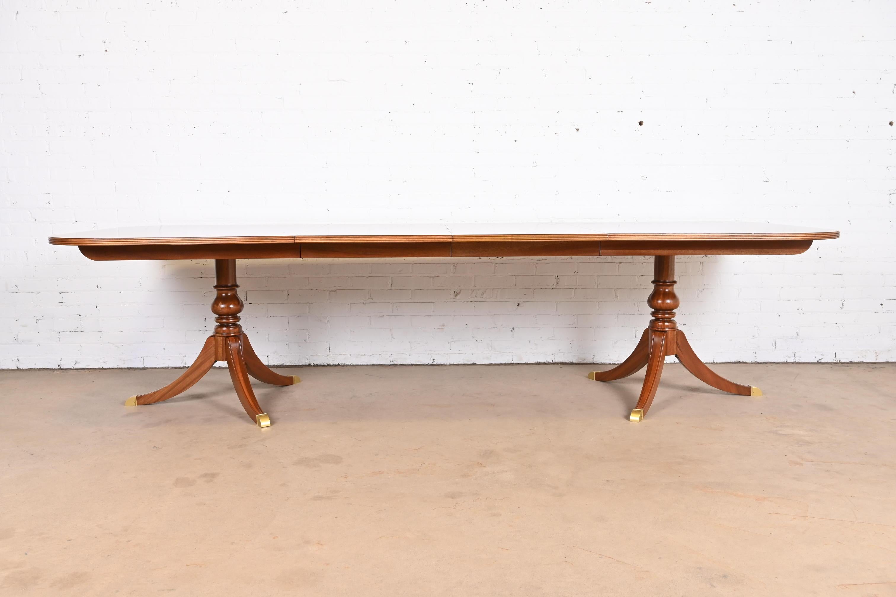 20th Century Georgian Flame Mahogany Double Pedestal Dining Table, Refinished For Sale