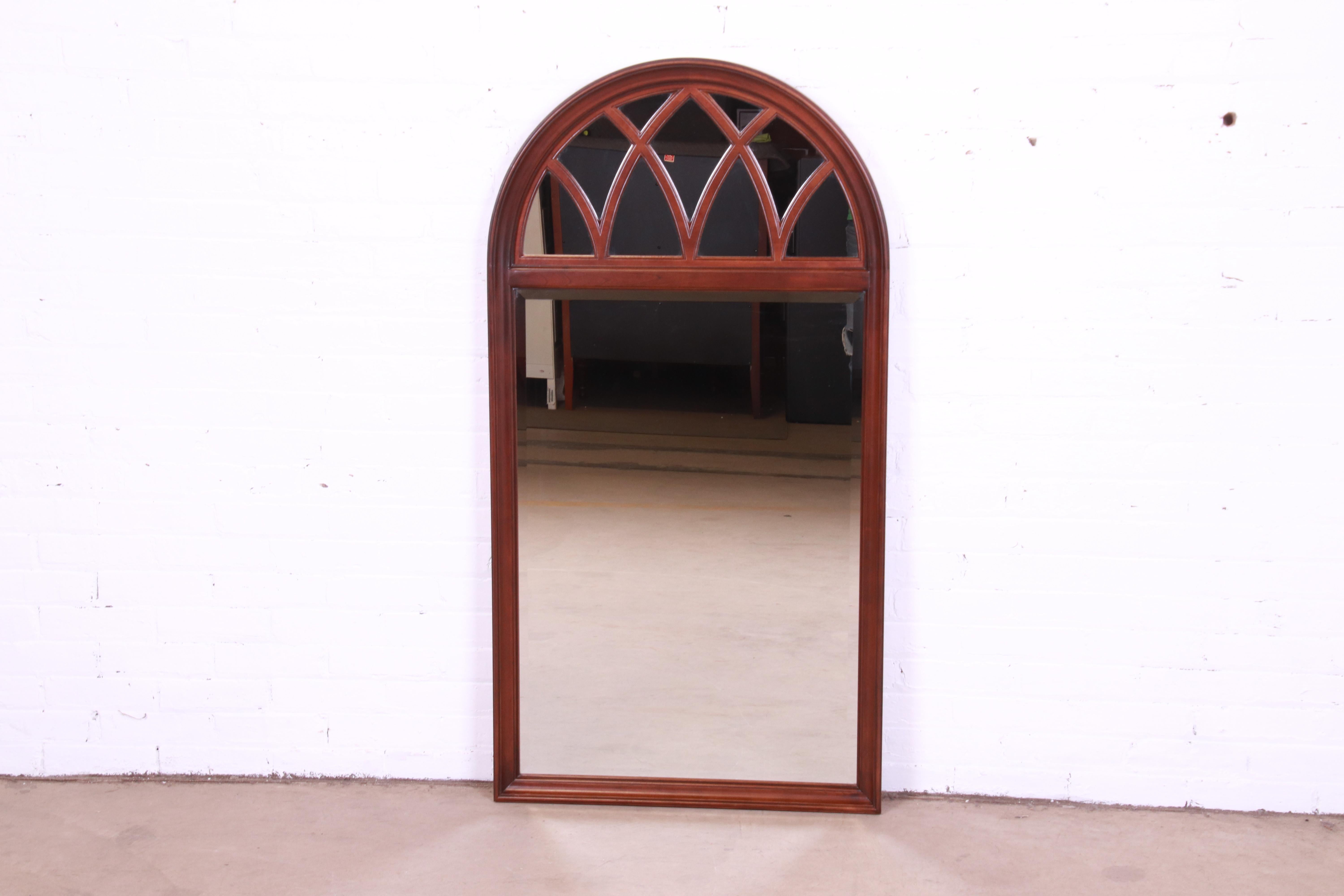 A gorgeous Palladian style mahogany framed arched wall mirror

USA, Circa 1990s

Measures: 28.25