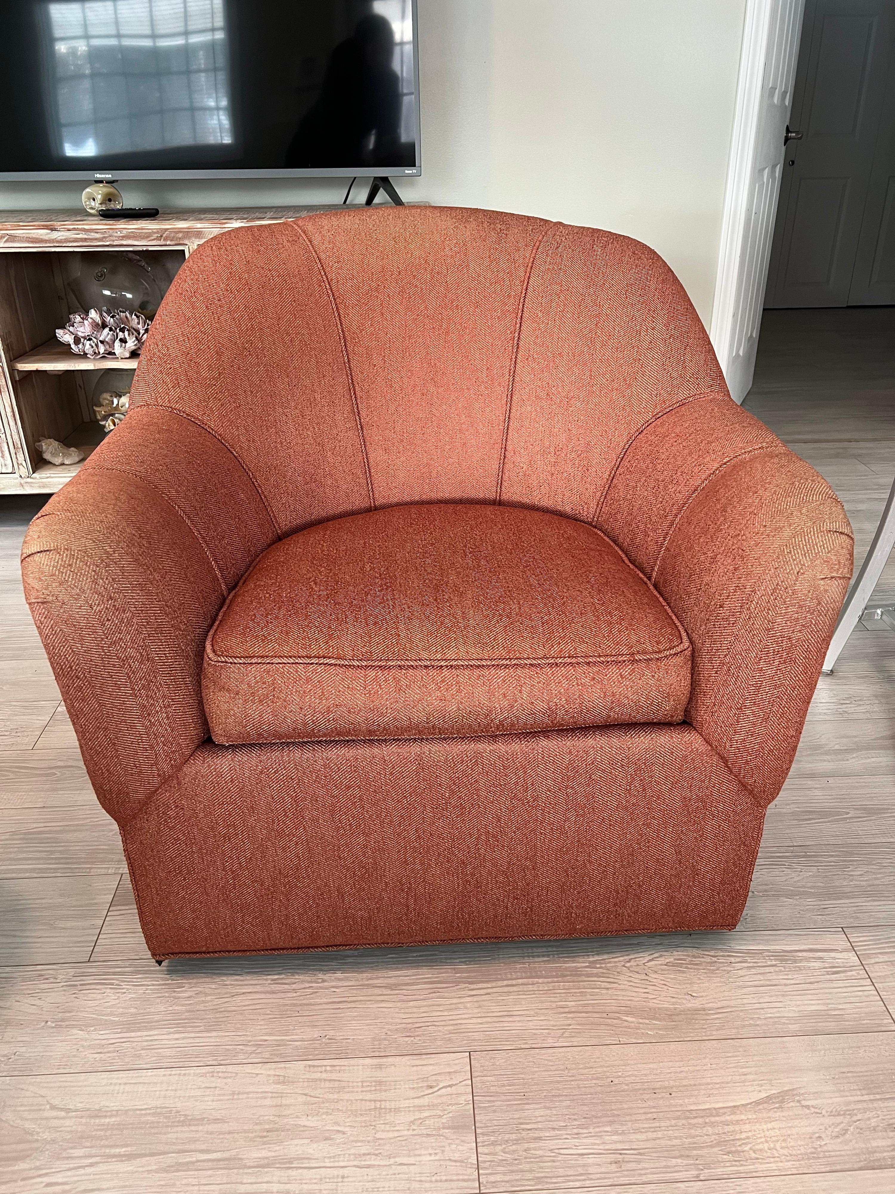 Amazing bones to this beauty. Solid construction and timeless lines to this perfectly designed swivel chair. Some fading to upholstery. Comes with upholstered arm covers. Nice larger size for that taller, bigger person.