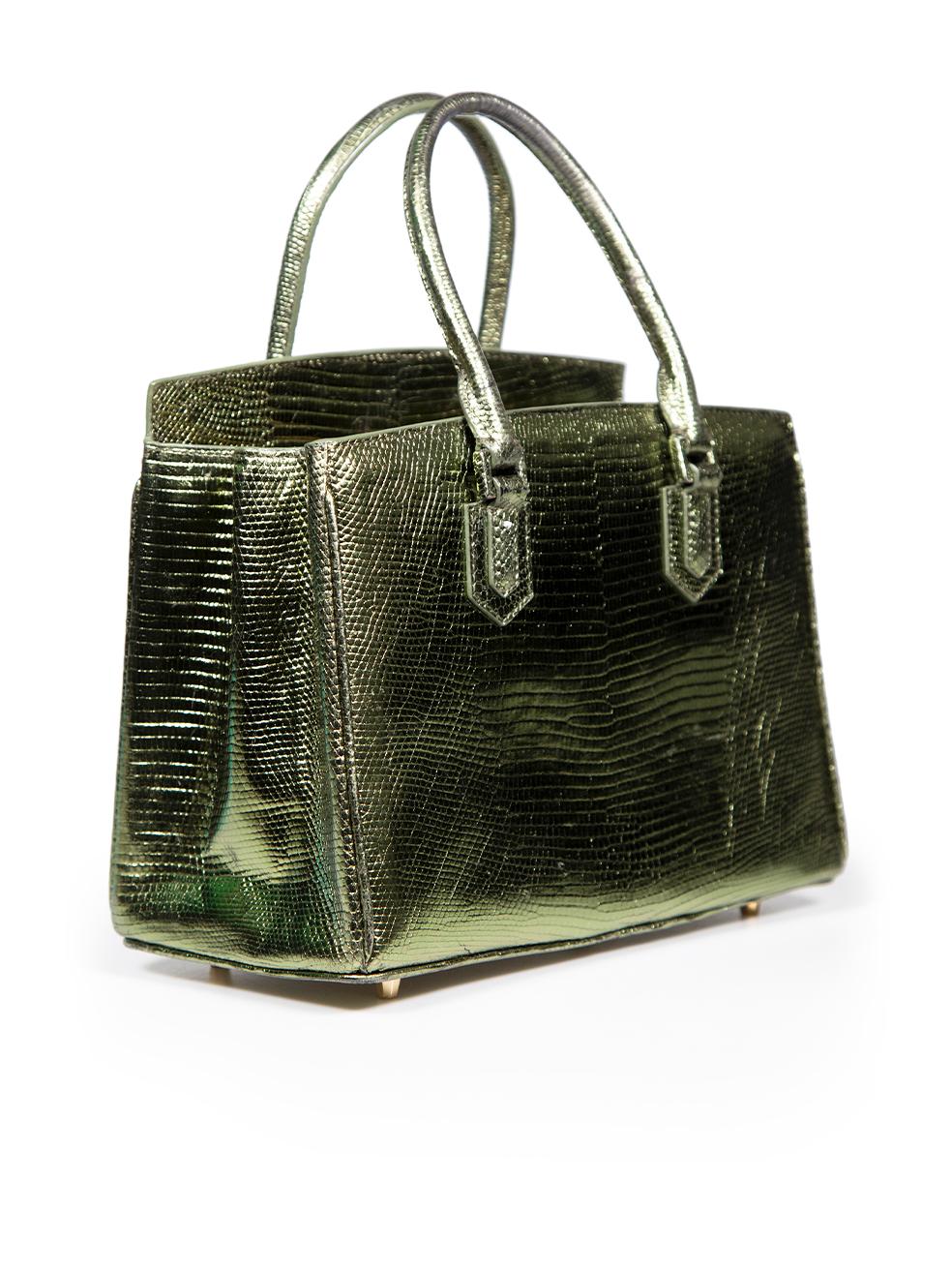 CONDITION is Very good. Minimal wear to bag is evident. Minimal wear to the base corners, top handle and trims with light discolouration to the lizard leather this used Ethan K designer resale item.
 
 
 
 Details
 
 
 Green
 
 Lizard leather
 
