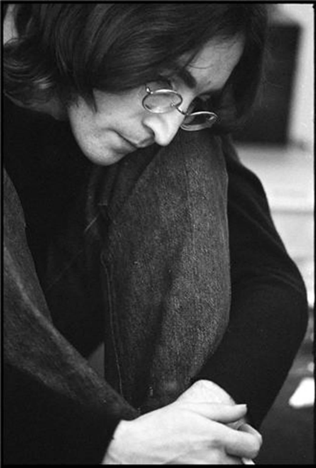 Ethan Russell Black and White Photograph - John Lennon, Listening to White Album, 1968