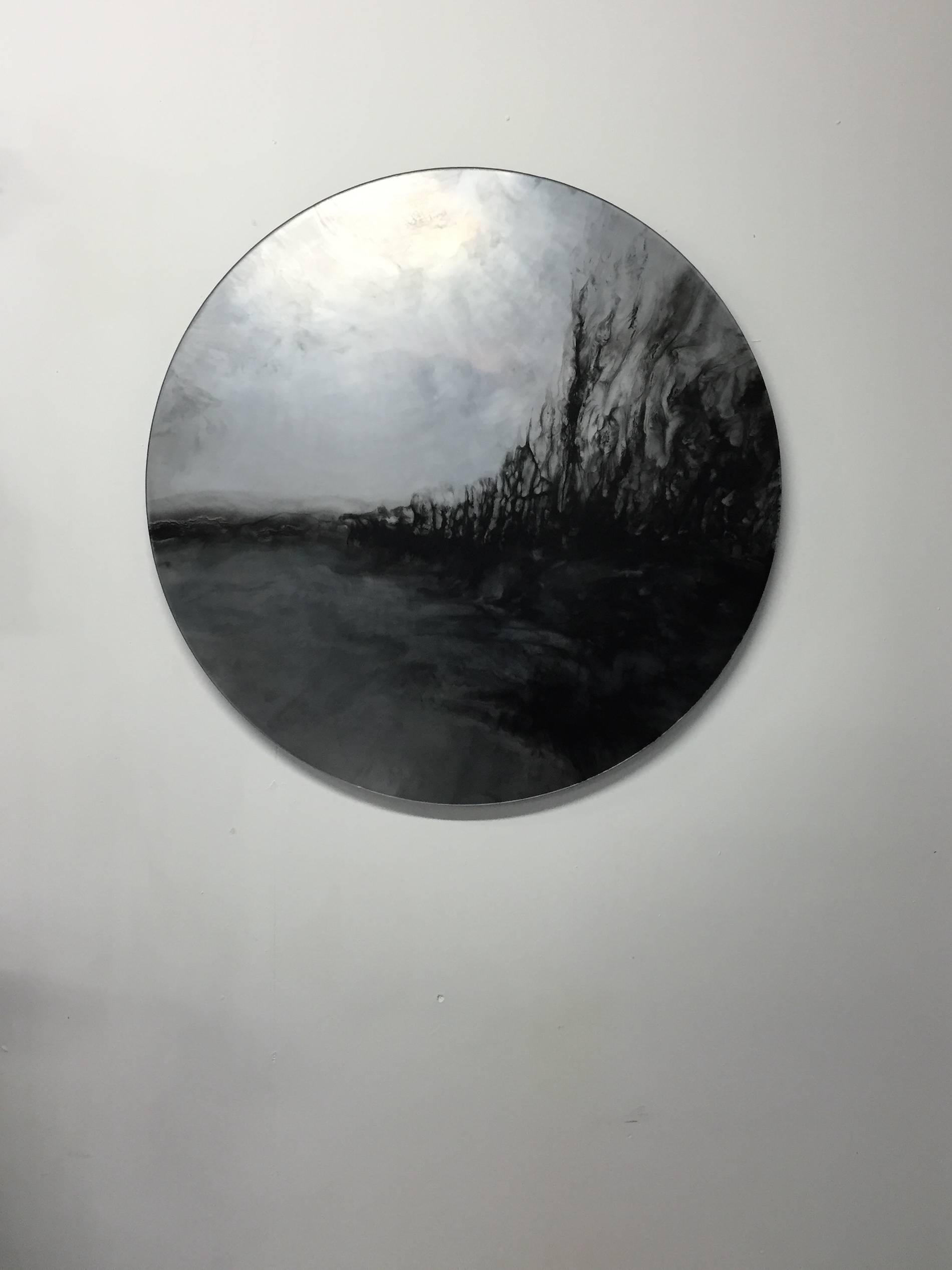 The Ether mirror is a subtly reflective piece with turbulent black clouds across its matte surface. While read first as an artwork and conversation piece it offers a Dual purpose for an interior scheme by providing an understated reflection of