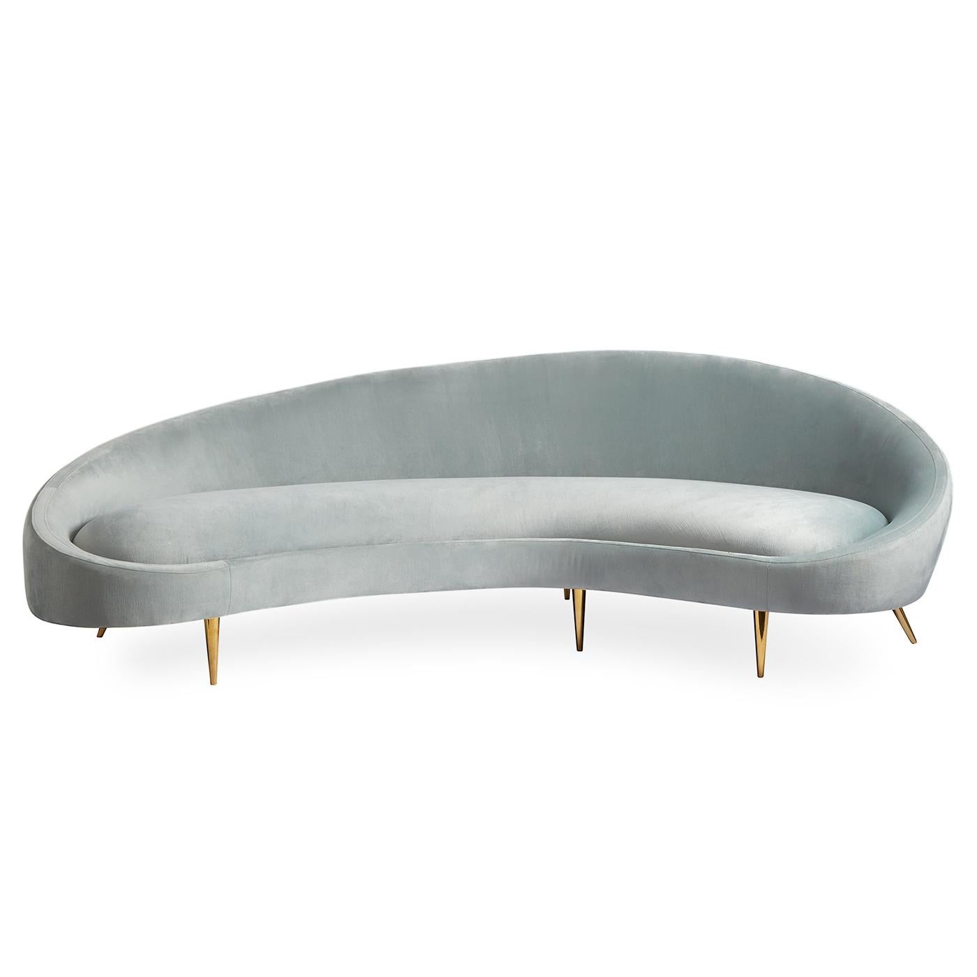 Heaven sent. A curved sofa announces to the world that you are on the varsity decorating squad. Airy yet edgy, our Ether Curved sofa is upholstered in heavenly Bergamo Azure velvet and perched on polished brass stiletto legs.

More than a pretty