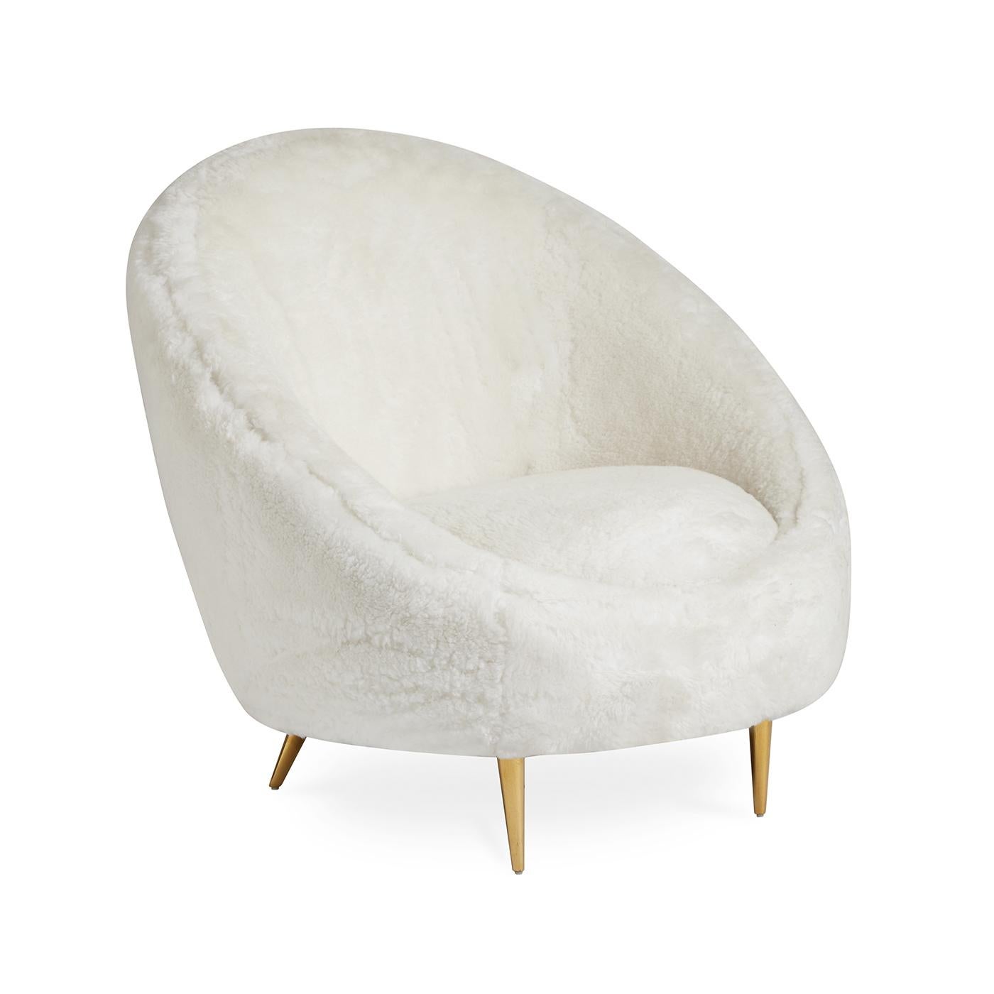 Haute Hygge. A Minimalist shape swathed in super-luxurious shearling, our Shearling Ether Chair is the perfect combination of ultra-cozy and ultra-luxe. The capsule-inspired Silhouette provides surprising comfort, the sumptuous upholstery is