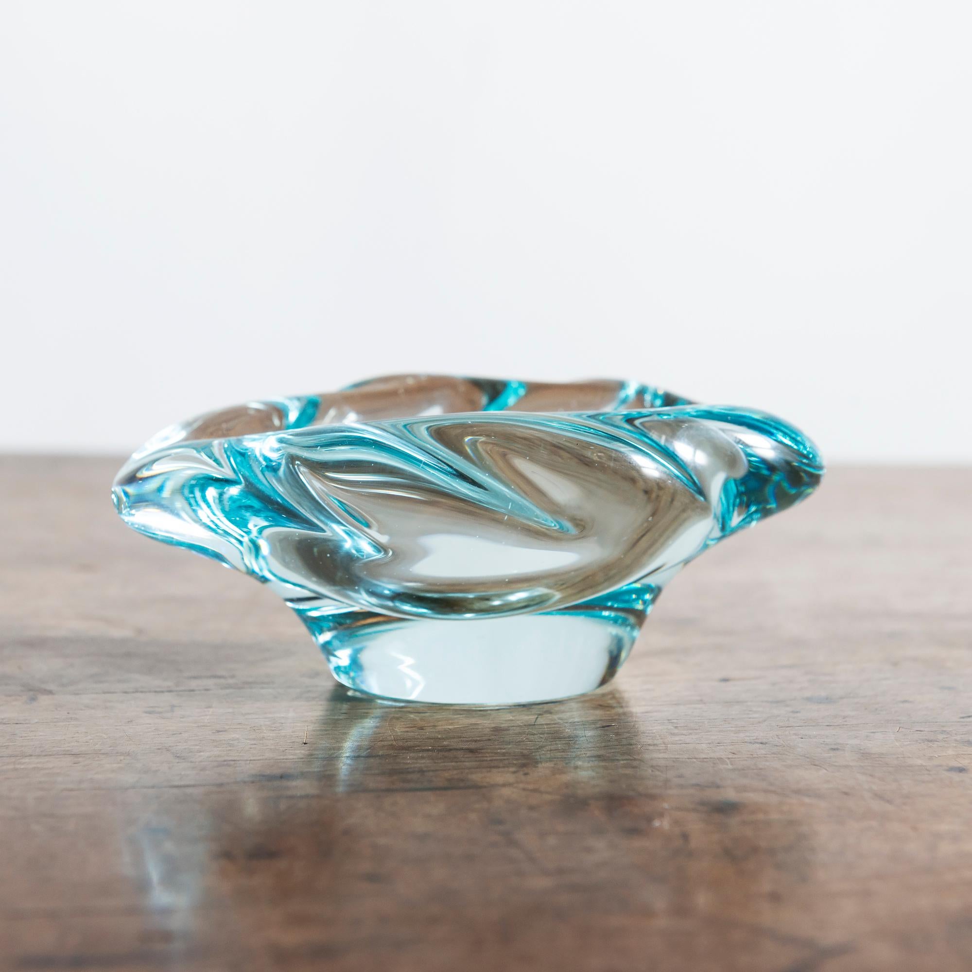 Gorgeous crystal bowl in an ethereal blue by Daum. Lower side edge signed Daum Nancy France, 1950s.