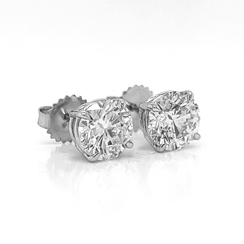 
Elevate your elegance with these stunning 14K White Gold Diamond Stud Earrings. Each earring features a dazzling 3.39-carat natural diamond, expertly cut to enhance its brilliance and fire. Certified by EGL USA, these diamonds promise exceptional