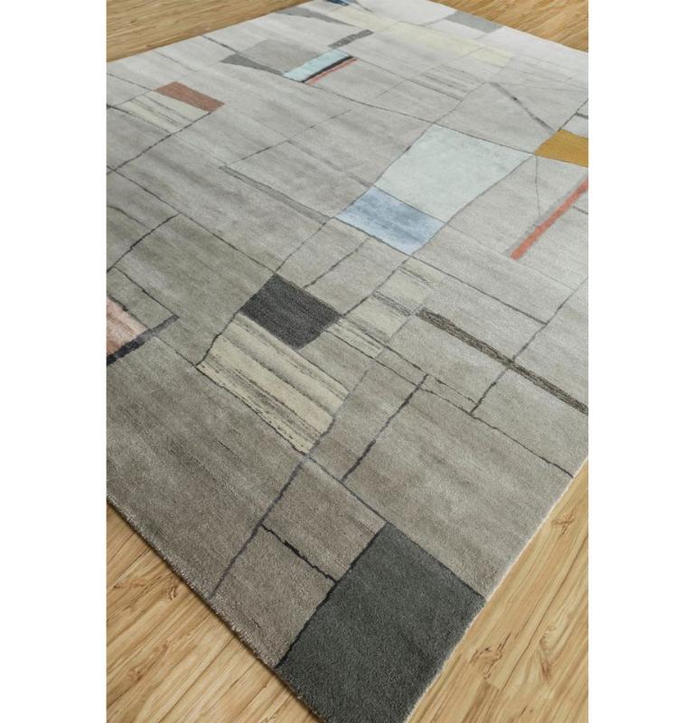 Introducing this hand knotted rug from our Aakar By Kavi collection. With its exquisite color combination of Classic Gray and Light Sea Mist, this rug is designed to elevate your living space to new heights of style. One can find this beauty in