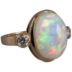 Ethiopian 7.00 Carat Rainbow Opal Diamond Bezel Ring 18 Karat Gold, Unique Rings