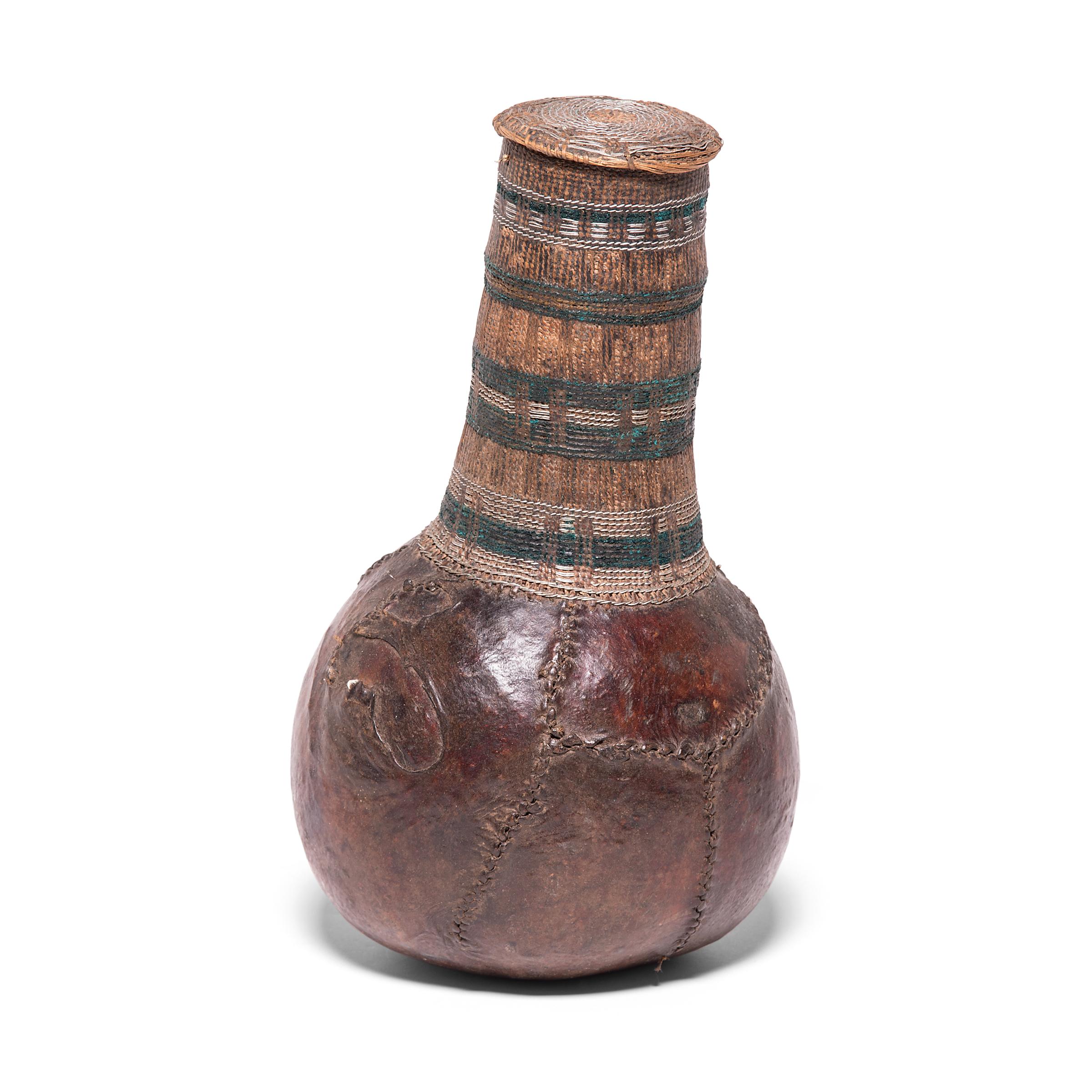 The Borana Oromo people of southern Ethiopia and northern Kenya are historically a cattle-keeping culture, and each household keeps a number of traditional vessels for storing and churning cow's milk. This bottle-form vessel would have been used