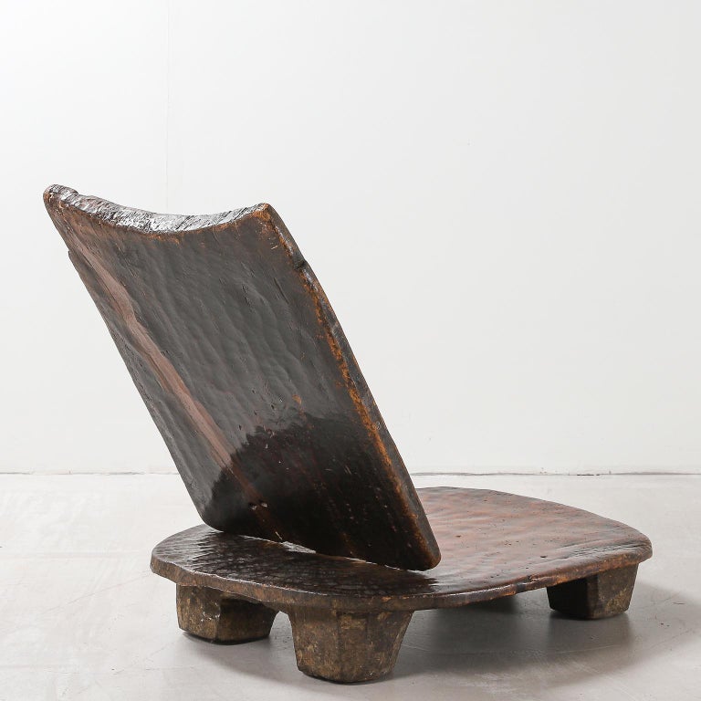 20th Century Ethiopian Dark Wood Low Tribal Chair with Removable Panel Back For Sale