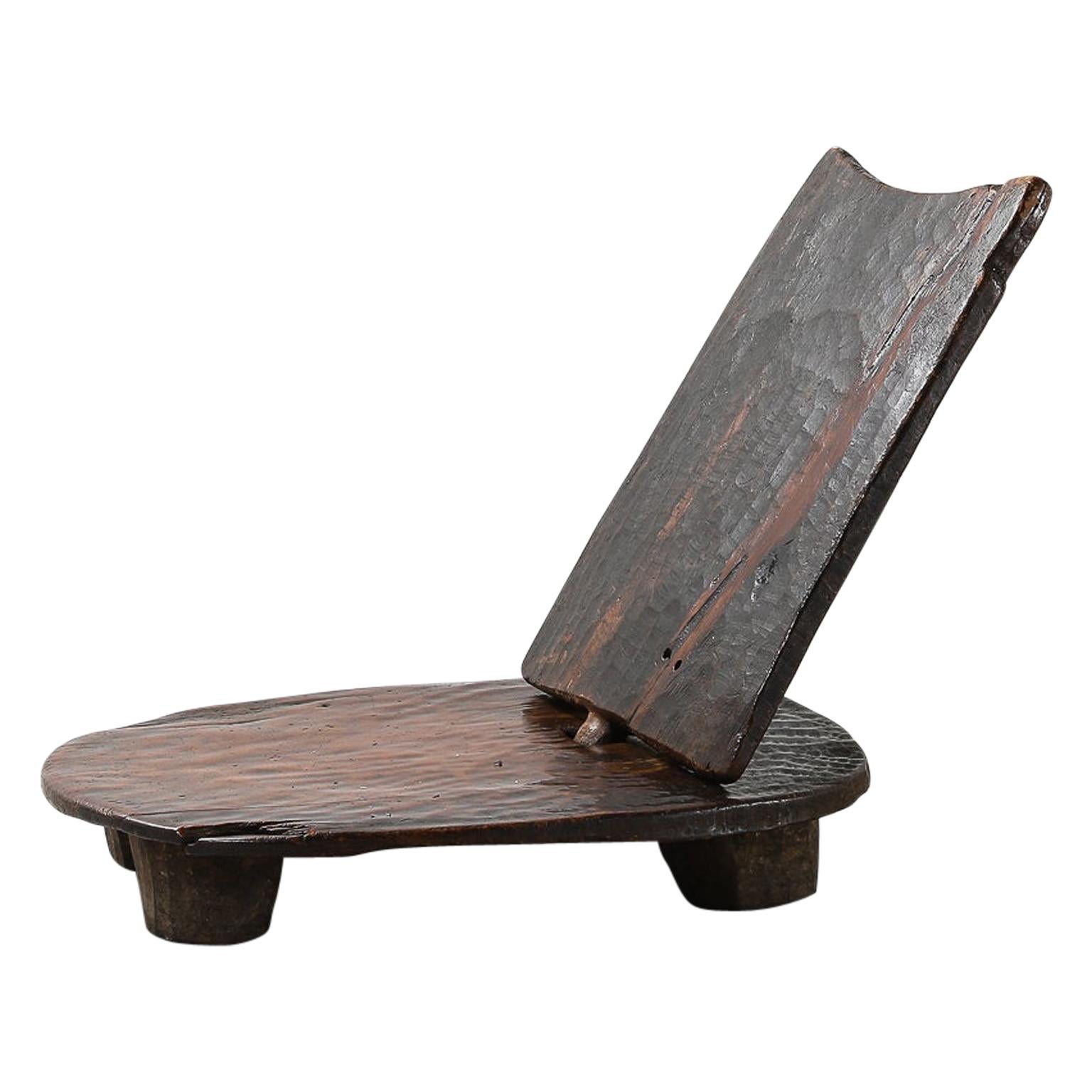 Ethiopian Dark Wood Low Tribal Chair with Removable Panel Back For Sale