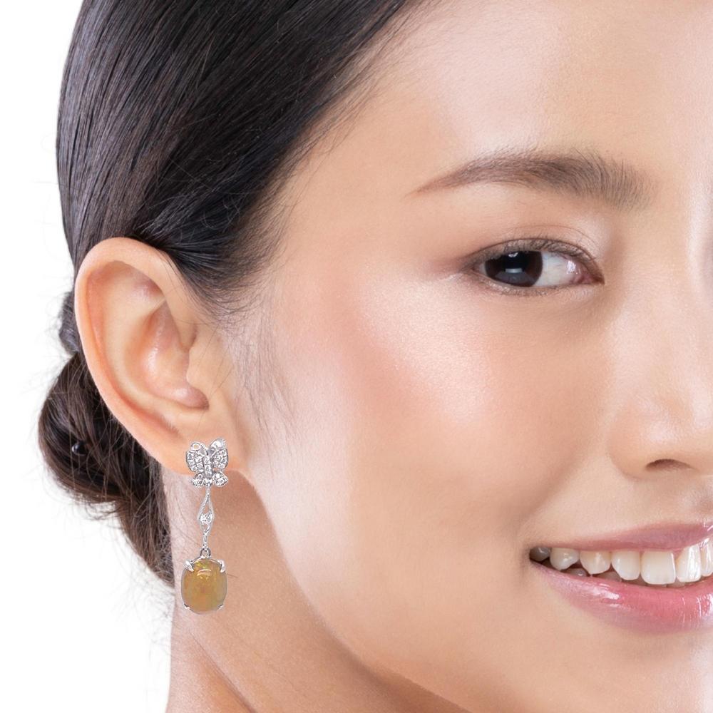 Oval Cut Ethiopian Opal and Diamond Dangling Earrings in 14KW Gold For Sale
