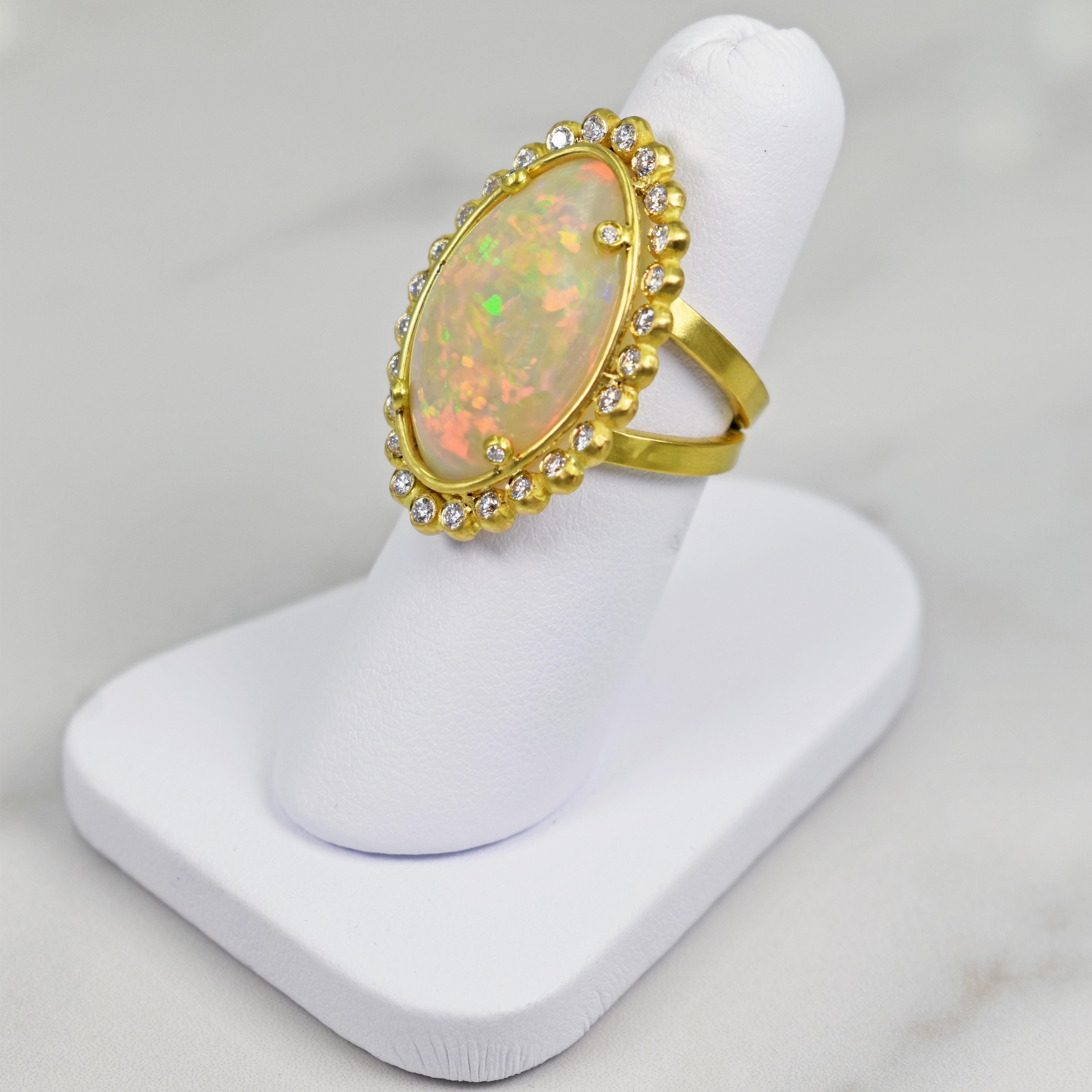 Contemporary 12.19 Carat Ethiopian Opal and Diamond Halo 22 Karat Gold Cocktail Ring For Sale