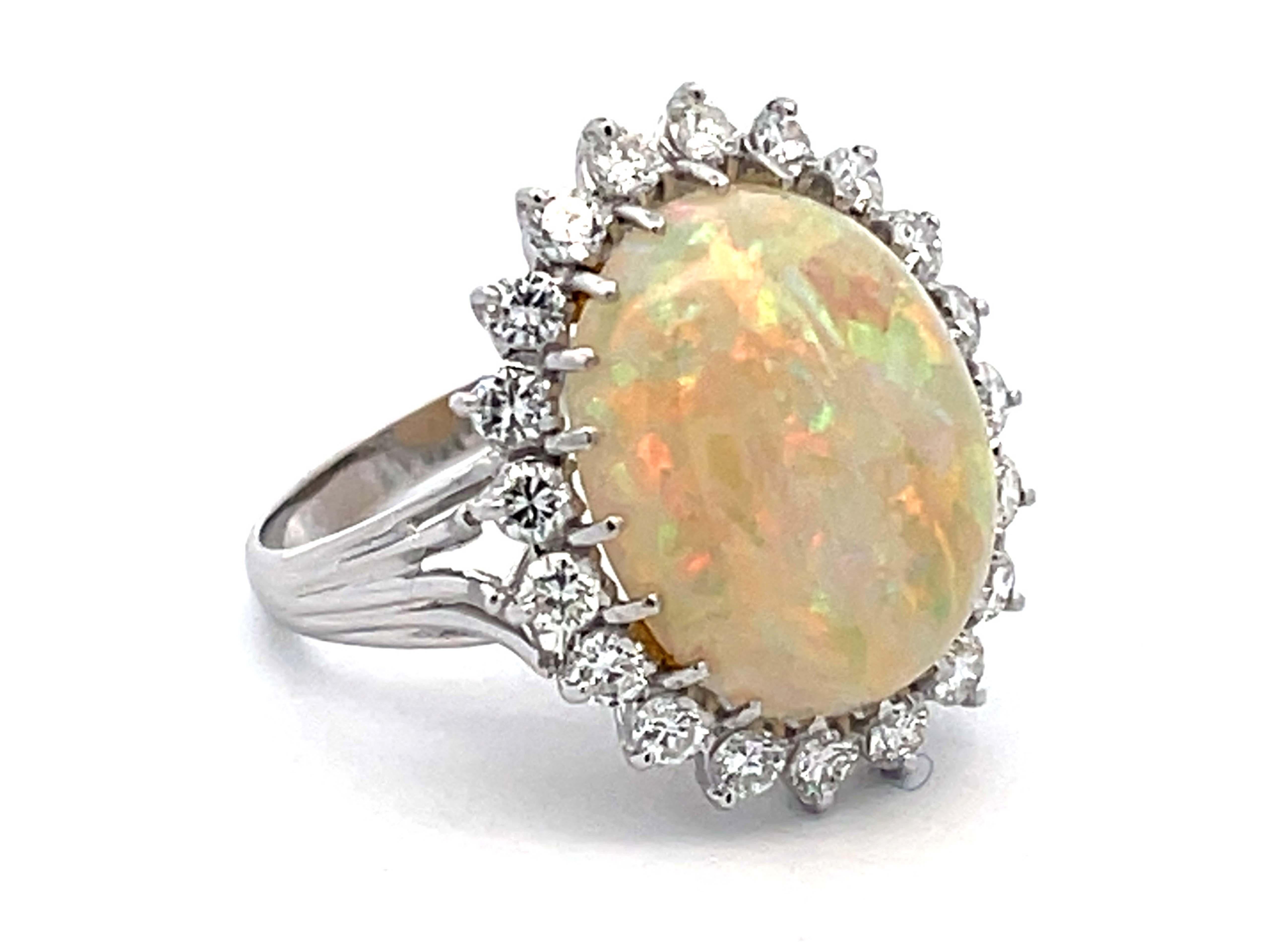 Modern Ethiopian Opal and Diamond Halo Ring in 14k White Gold For Sale