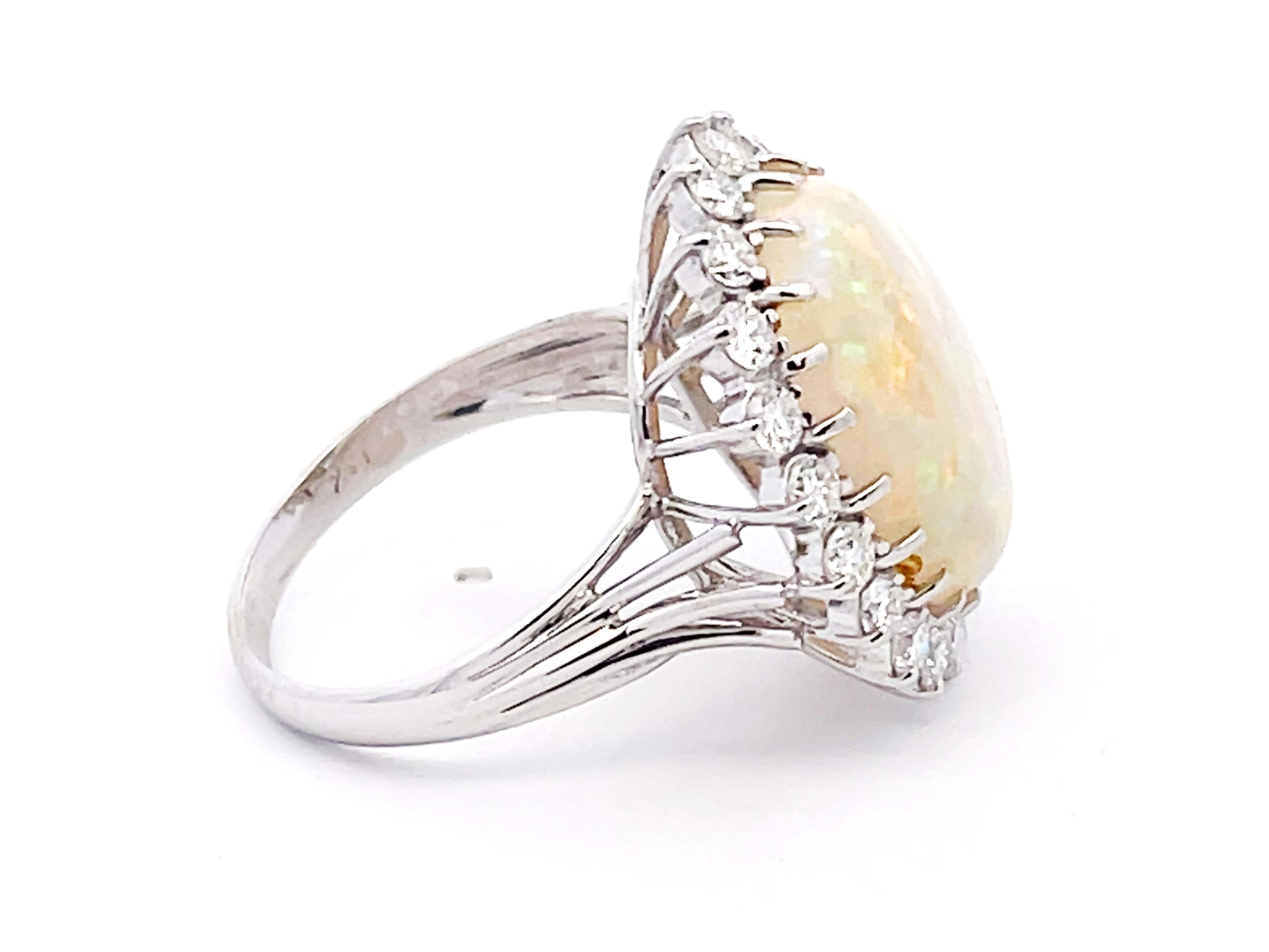 Ethiopian Opal and Diamond Halo Ring in 14k White Gold In Excellent Condition For Sale In Honolulu, HI