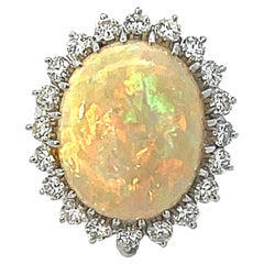 Retro Ethiopian Opal and Diamond Halo Ring in 14k White Gold