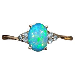 Ethiopian Opal Bypass Ring w Diamond Accents in Solid 14k Yellow Gold Oval 7x5mm