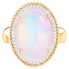 Anillo de cóctel de ópalo etíope Halo de diamantes 8,31 quilates Oro amarillo de 14 quilates