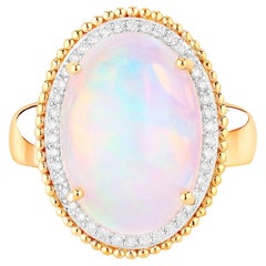 Anillo de cóctel de ópalo etíope Halo de diamantes 8,31 quilates Oro amarillo de 14 quilates