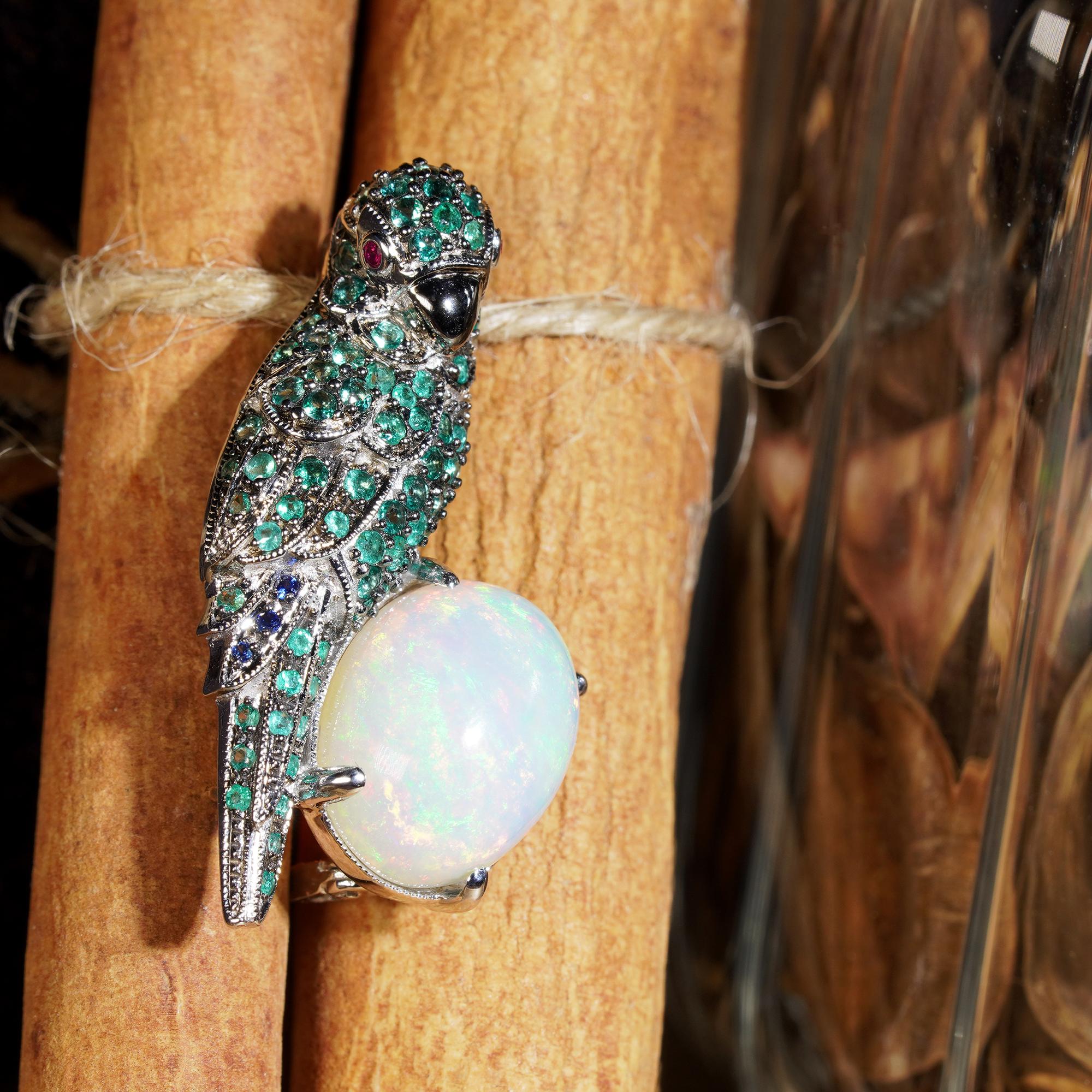 Delightfully chic and exquisitely detailed, this brooch features an artfully stylized depiction of one of nature’s creation. The body and tail of the parrot features emeralds and sapphires set its trailing feathers, rubies on its eyes. It’s perching