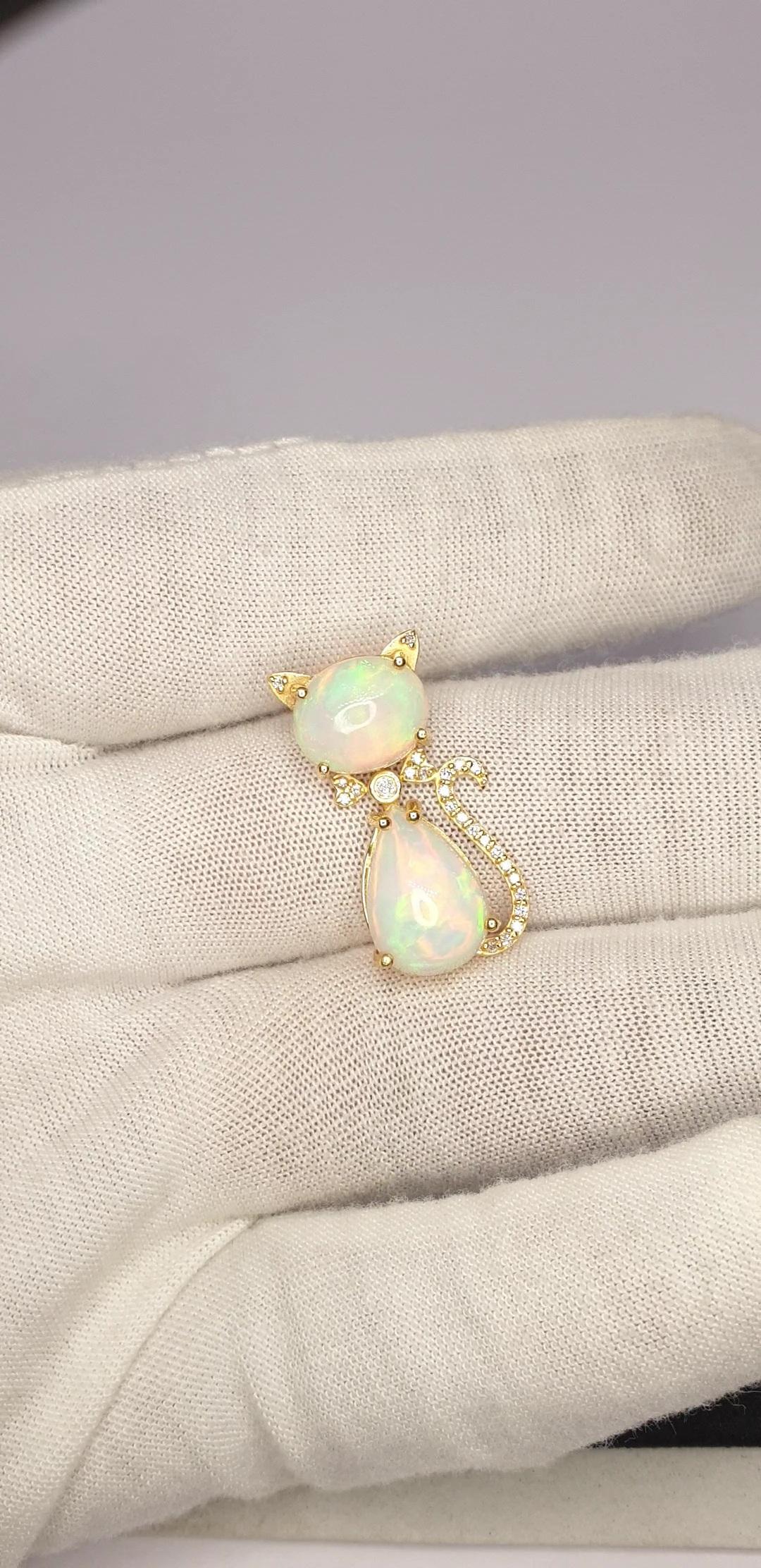 Ethiopian Opal Cat Pendant 14K Solid Gold Kitten Shape Pendant For Valentine Day

Gross Weight: : 3.07 Grams Approx.
Diamond Weight: : 0.15 cts Approx.
14K Gold Weight: : 1.44 Grams Approx.
Size: 28x13 mm Approx.
Opal Weight: 8 Cts Approx.
Light