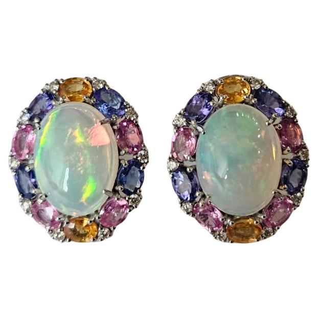 Ethiopian Opal, Multi Sapphire, Tanzanite
Diamonds Stud Earrings in 18K Gold