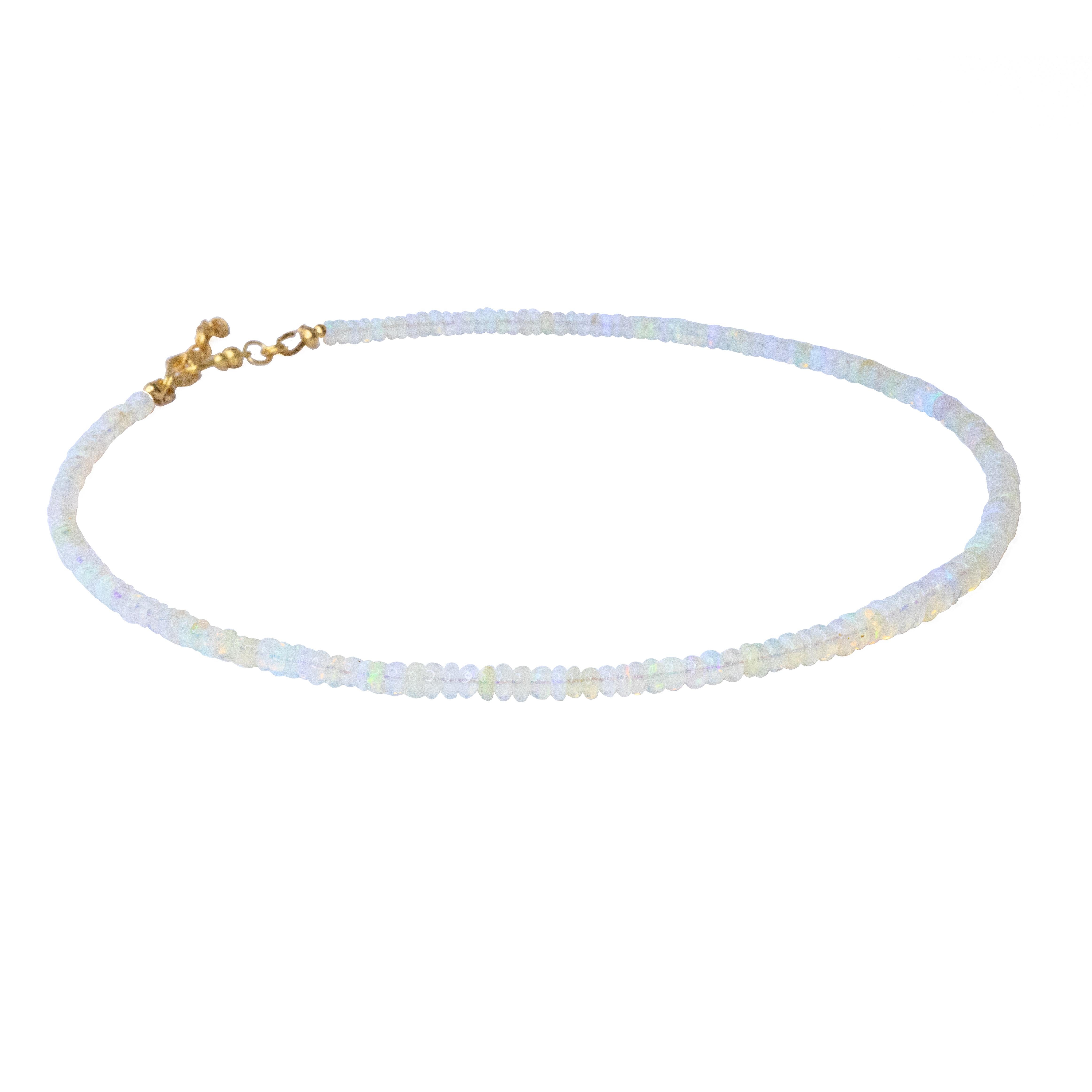 Ce collier est composé d'opales éthiopiennes graduées. Fermeture à crochet en argent sterling plaqué or 120K.
	•	Longueur totale de 16