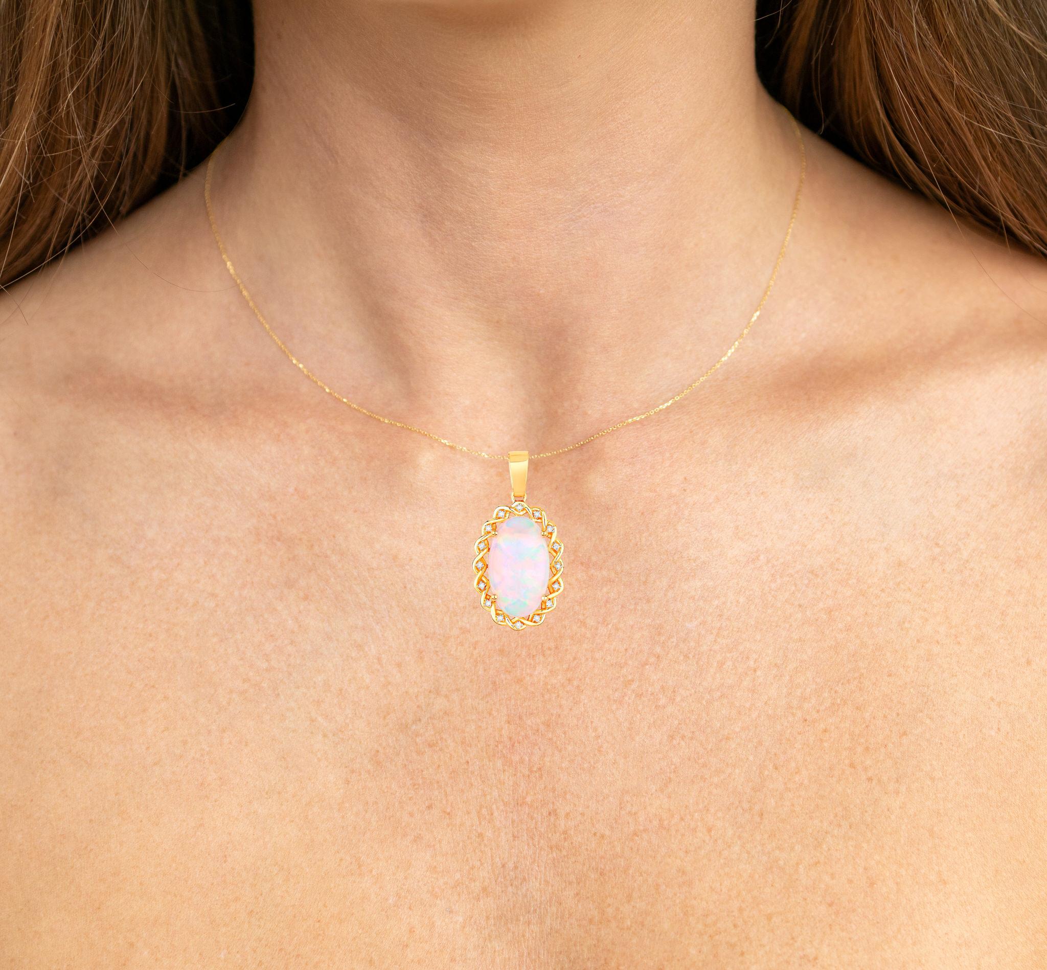It comes with the Gemological Appraisal by GIA GG/AJP
All Gemstones are Natural
Ethiopian Opal = 7.95 Carats
16 Diamonds = 0.16 Carats
Metal: 14K Yellow Gold
Pendant Dimensions: 36 x 19 mm
Jewelry Gift Box & Silver Chain Included