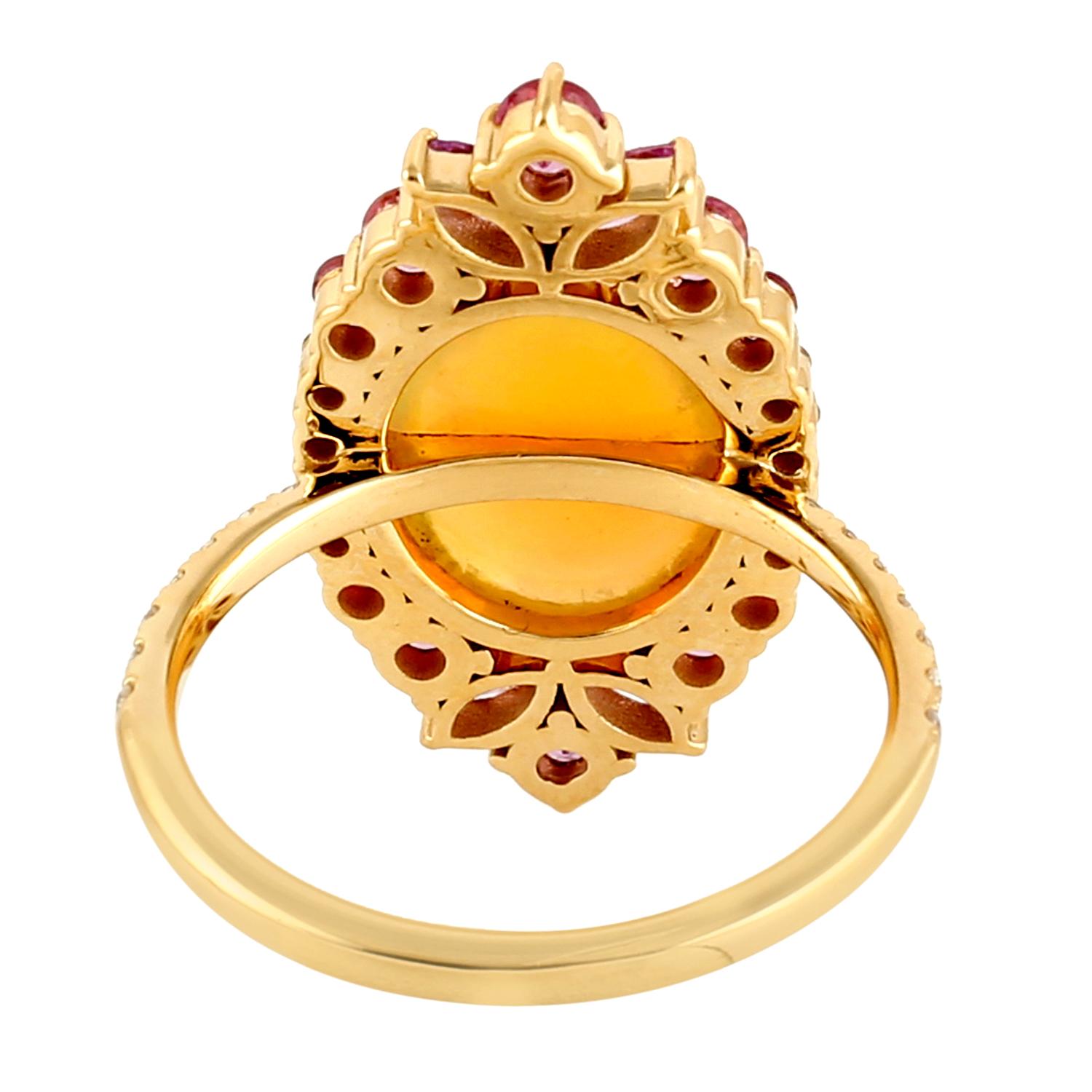 This ring has been meticulously crafted from 14-karat gold.  It is hand set with 2.97 carat Ethiopian opal, 1.36 carats sapphire & .25 carats of sparkling diamonds. 

The ring is a size 7 and may be resized to larger or smaller upon request. 
FOLLOW