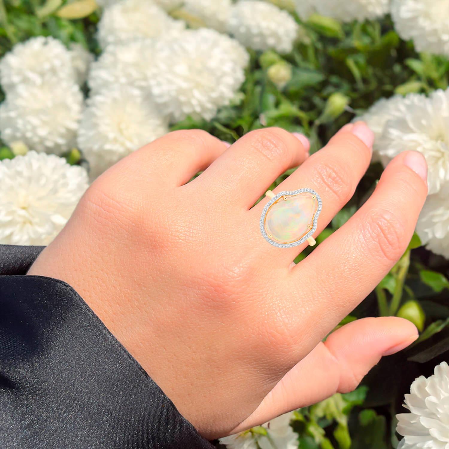 It comes with the Gemological Appraisal by GIA GG/AJP
All gemstones are natural
Ethiopian Opal = 5.22 Carats
58 Diamonds = 0.16 Carats
Metal: 14K Yellow Gold
Ring Size: 7* US
*It can be resized complimentary