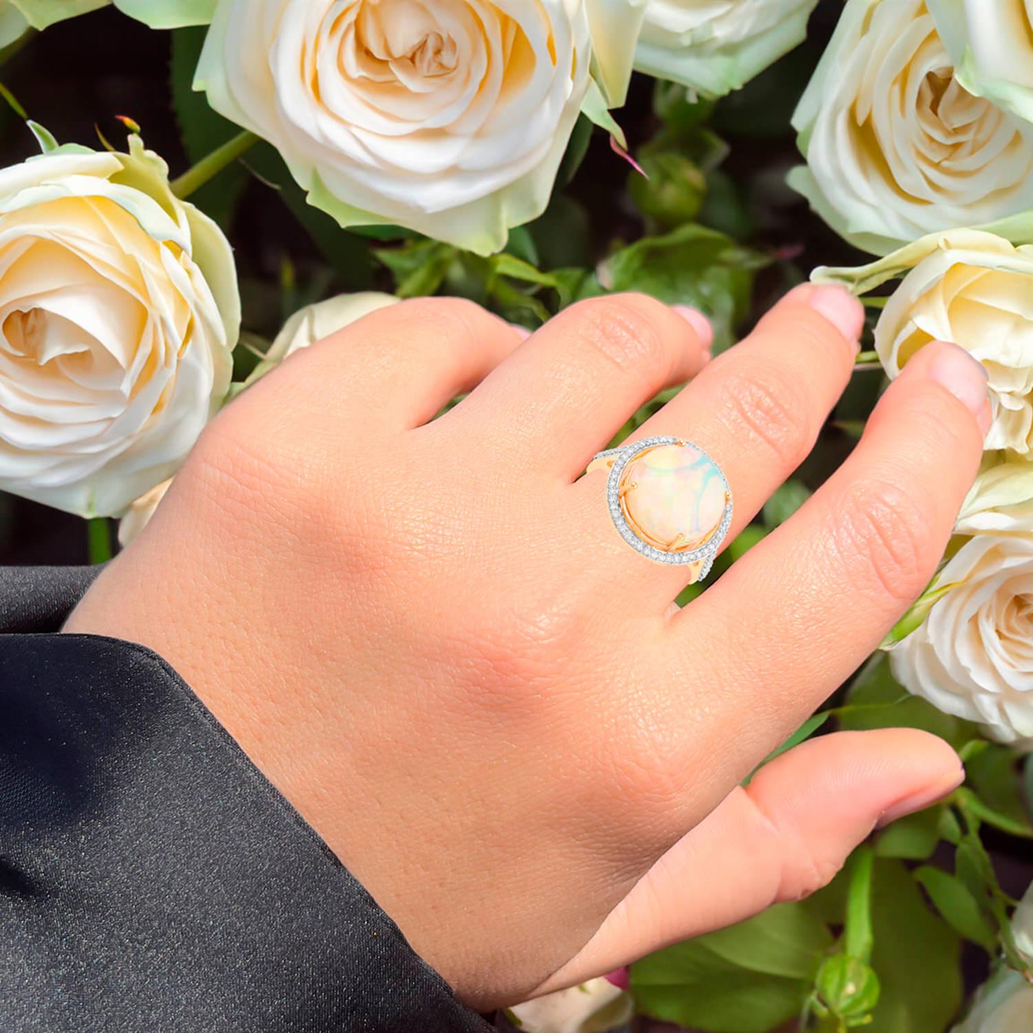 It comes with the Gemological Appraisal by GIA GG/AJP
All gemstones are natural
Ethiopian Opal = 5.55 Carats
62 Diamonds = 0.28 Carats
Metal: 14K Yellow Gold
Ring Size: 7* US
*It can be resized complimentary