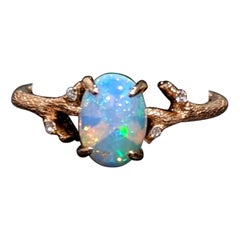 Ethiopian Opal Ring in Solid 14k Rose Gold Oval 7x5mm