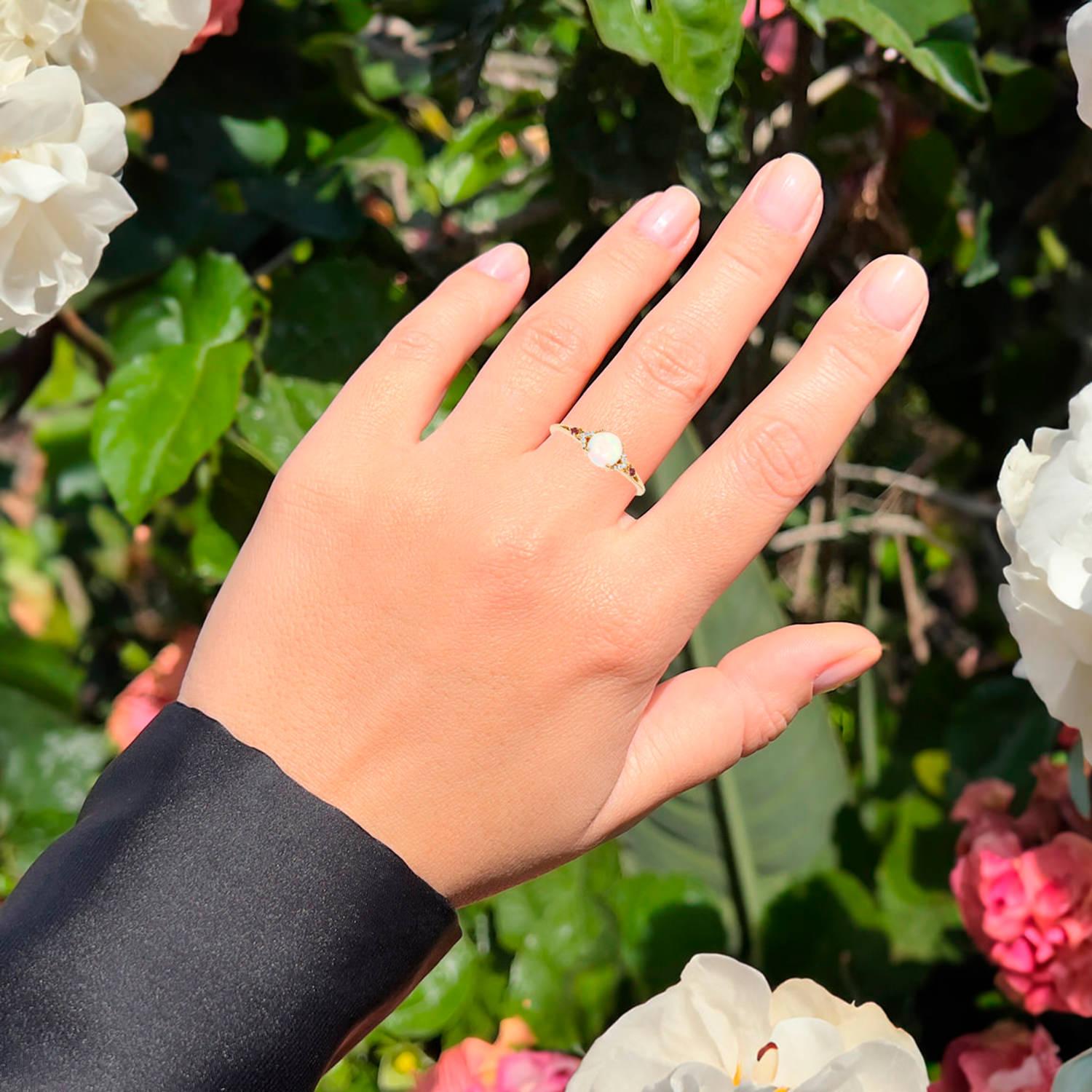 It comes with the Gemological Appraisal by GIA GG/AJP
All gemstones are natural
Ethiopian Opal = 0.50 Carats
2 Pink Tourmalines = 0.03 Carats
10 Diamonds = 0.03 Carats
Metal: 14K Yellow Gold
Ring Size: 7* US
*It can be resized complimentary
