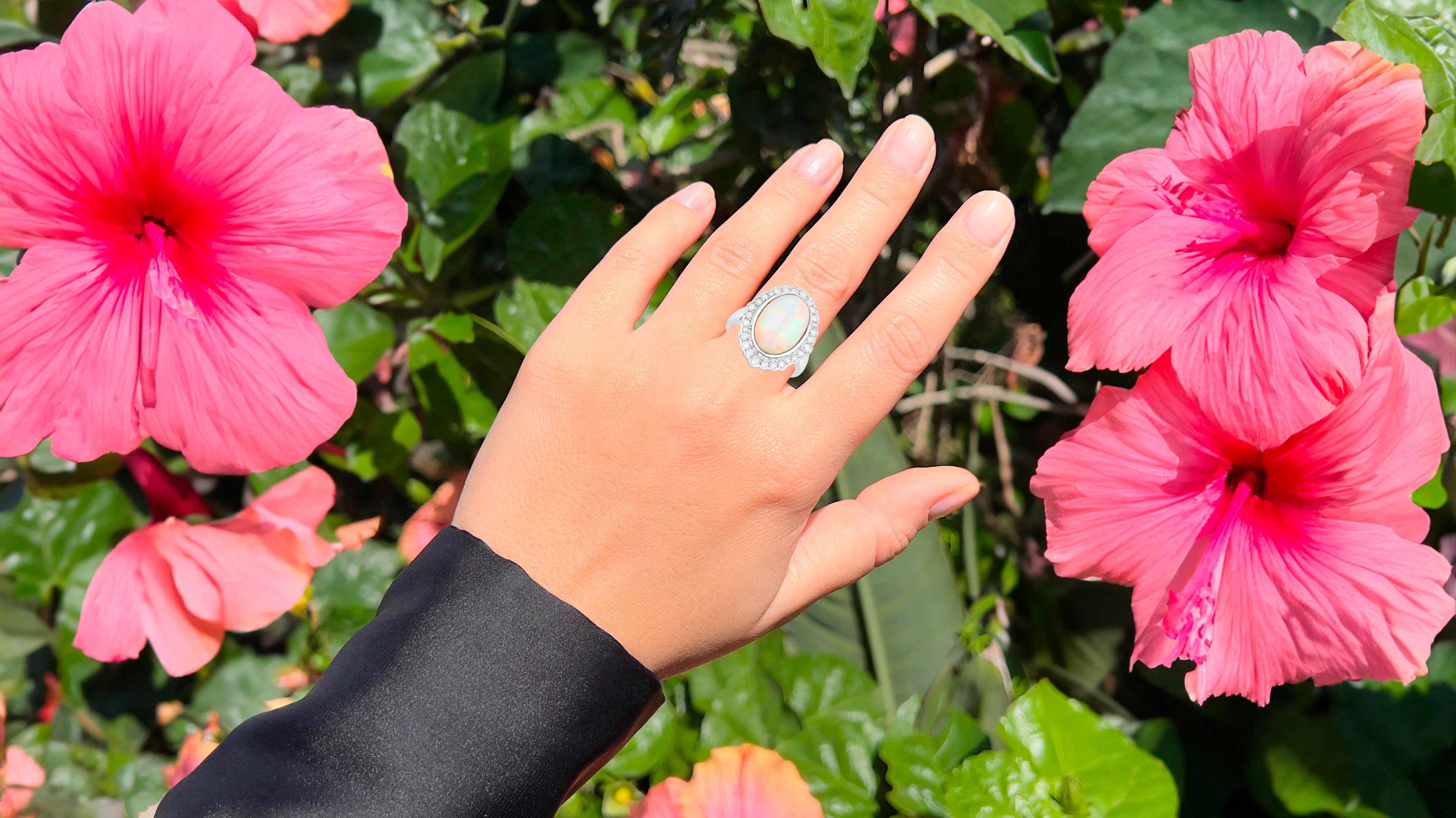 It comes with the Gemological Appraisal by GIA GG/AJP
All Gemstones are Natural
Ethiopian Opal = 5.68 Carat
28 Diamonds = 0.70 Carats
Metal: 14K White Gold
Ring Size: 7* US
*It can be resized complimentary