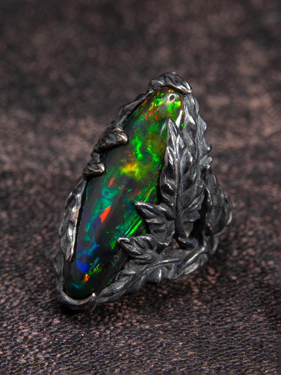 Connect with the latest addition to our Ivy collection and celebrate a special moment from the second it arrives. The flawlessly cut Opal sits at the center of an silver ring that’s blended in perfect harmony with patina to give a blackened finish.