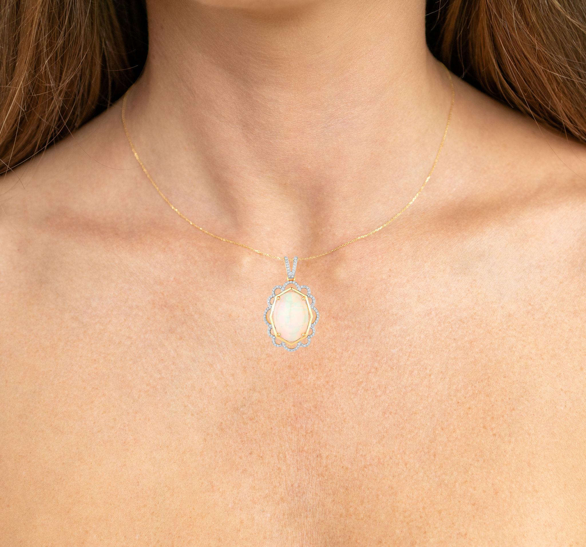 It comes with the Gemological Appraisal by GIA GG/AJP
All Gemstones are Natural
Oval Shape Ethiopian Opal = 6.70 Carat
Cut: Cabochon
94 Rond Cut Diamonds = 0.32 Carats
Metal: 14K Yellow and White Gold
Pendant Dimensions: 20 x 35 mm