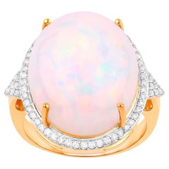 Anillo de oro de 14 quilates con ópalo etíope y halo de diamantes 12,3 quilates en total