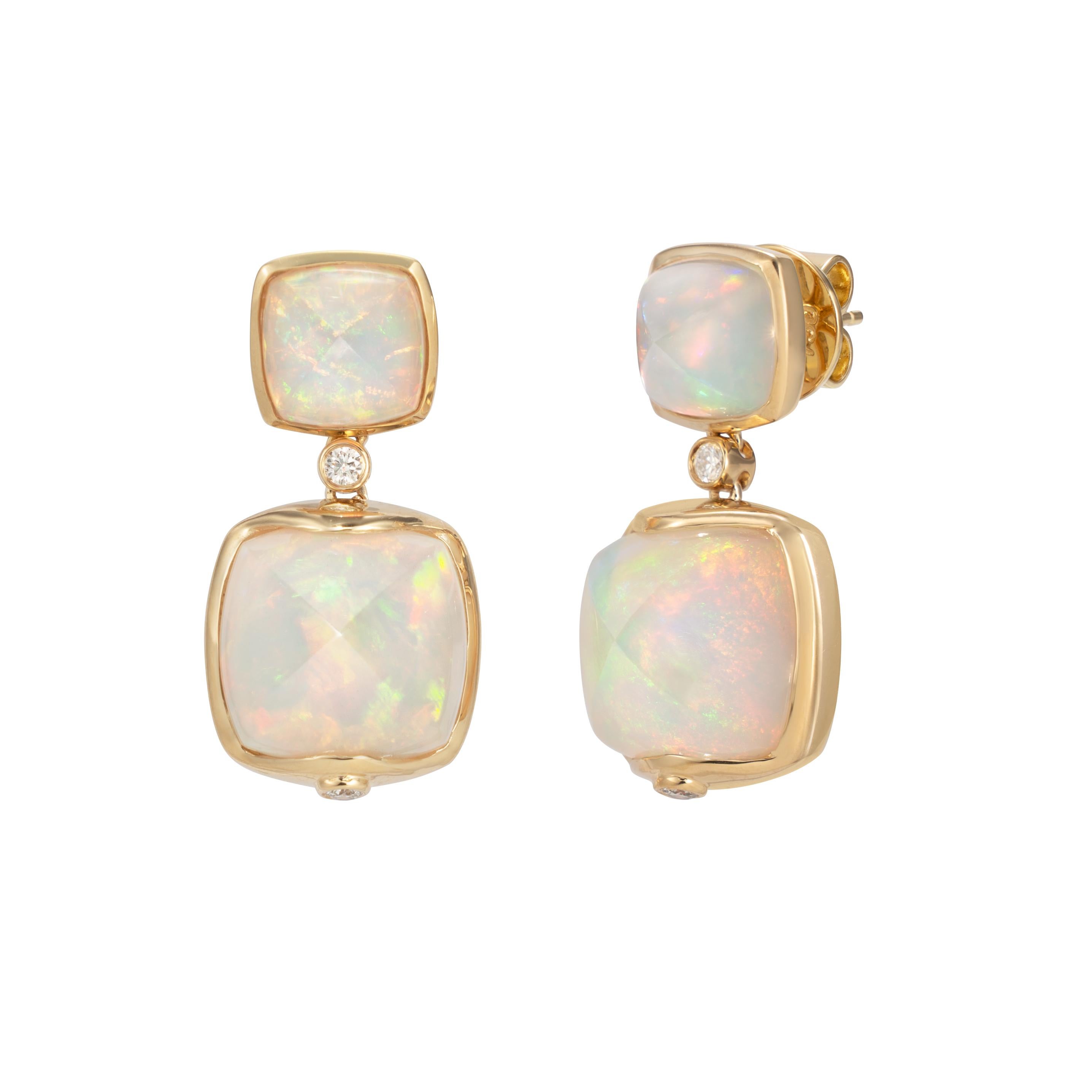 Sweet Sugarloaves! Light and easy to wear these earrings showcase beautiful sugarloaf gemstones accented with a gold frame and diamonds. These earrings are dainty yet have a great pop of color from the vibrant gems.

Ethiopian Opal Sugarloaf