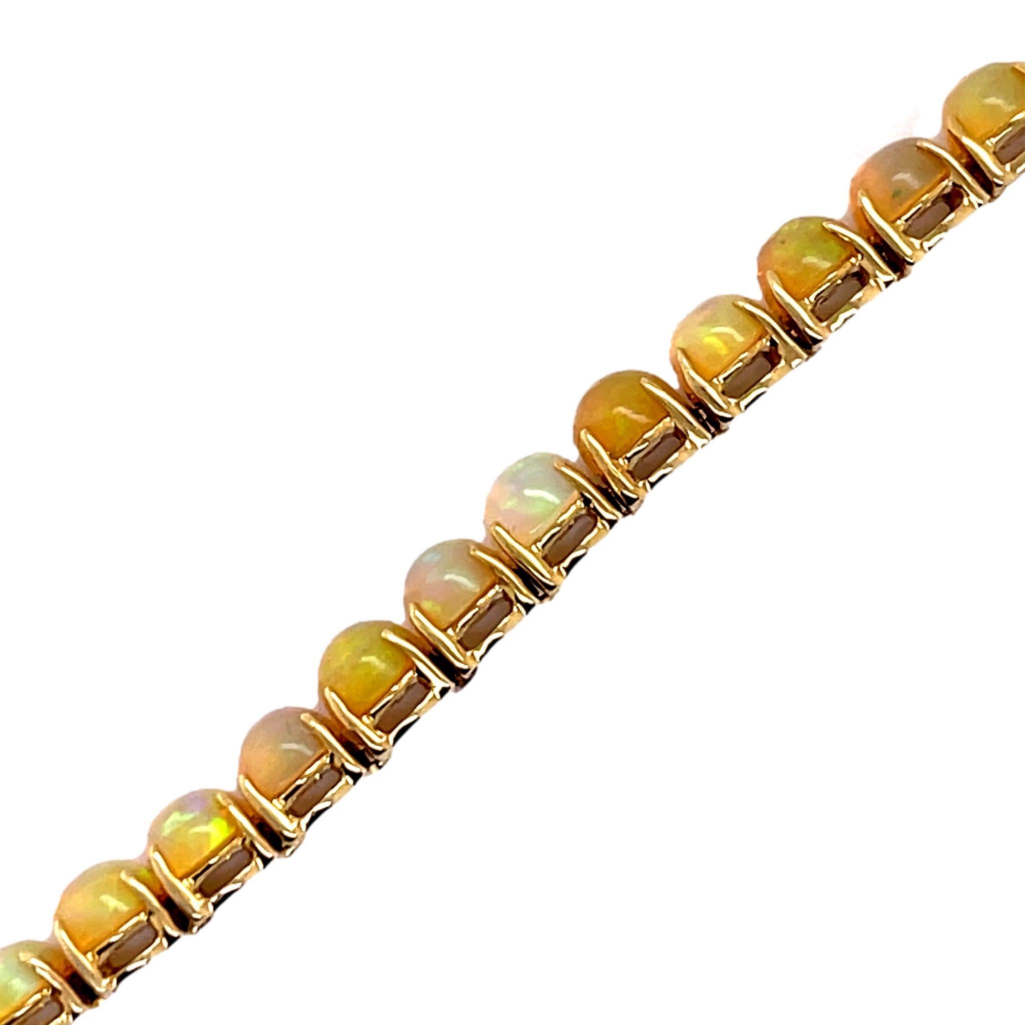 Äthiopisches Opal-Tennisarmband aus 14K Gelbgold (Rundschliff) im Angebot