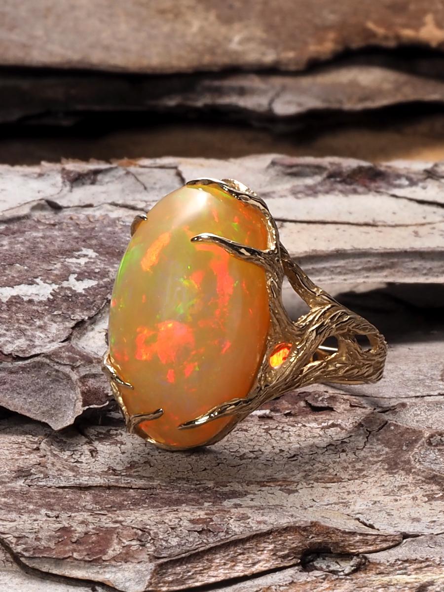 Natural Opal 14k yellow gold ring
opal origin - Ethiopia 
opal measurements - 0.31 х 0.47 х 0.79 in / 8 х 12 х 20 mm
stone weight - 11.40 carats
ring weight - 6.54 grams
ring size - 7 US

Roots Collection 


We ship our jewelry worldwide – for our