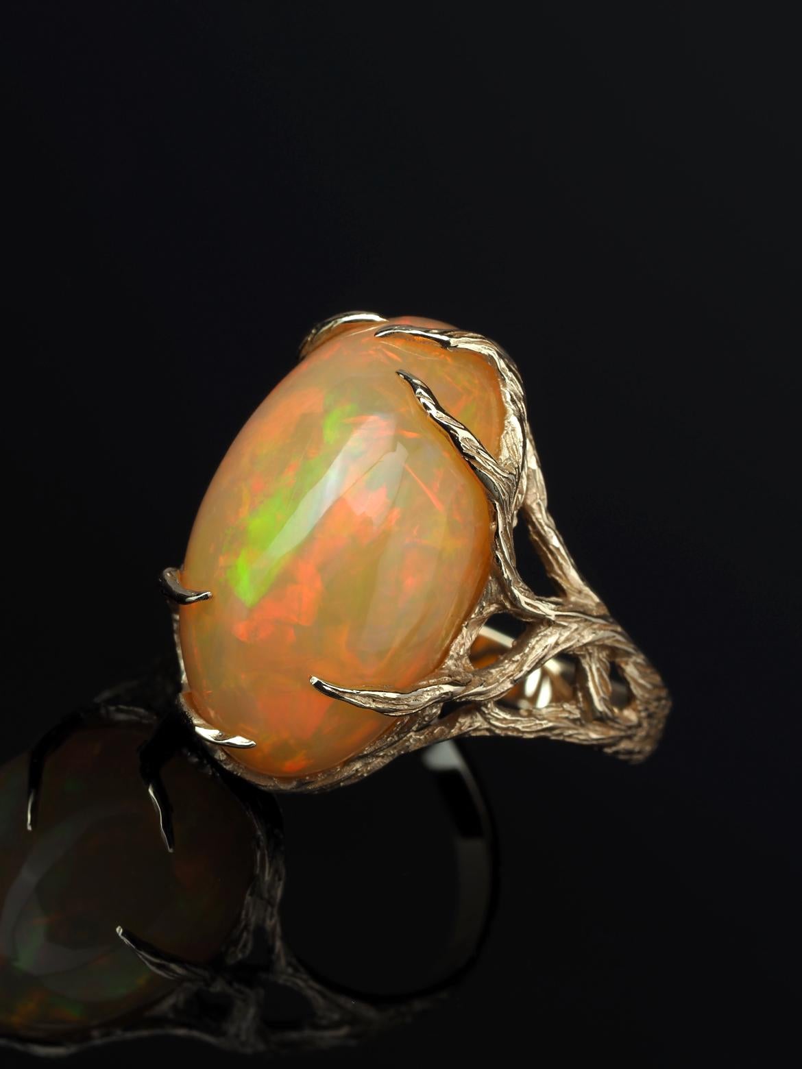 Natural Opal 14k yellow gold ring
opal origin - Ethiopia 
opal measurements - 0.31 х 0.47 х 0.79 in / 8 х 12 х 20 mm
stone weight - 11.40 carats
ring weight - 6.54 grams
ring size - 7 US

Roots Collection 


We ship our jewelry worldwide – for our