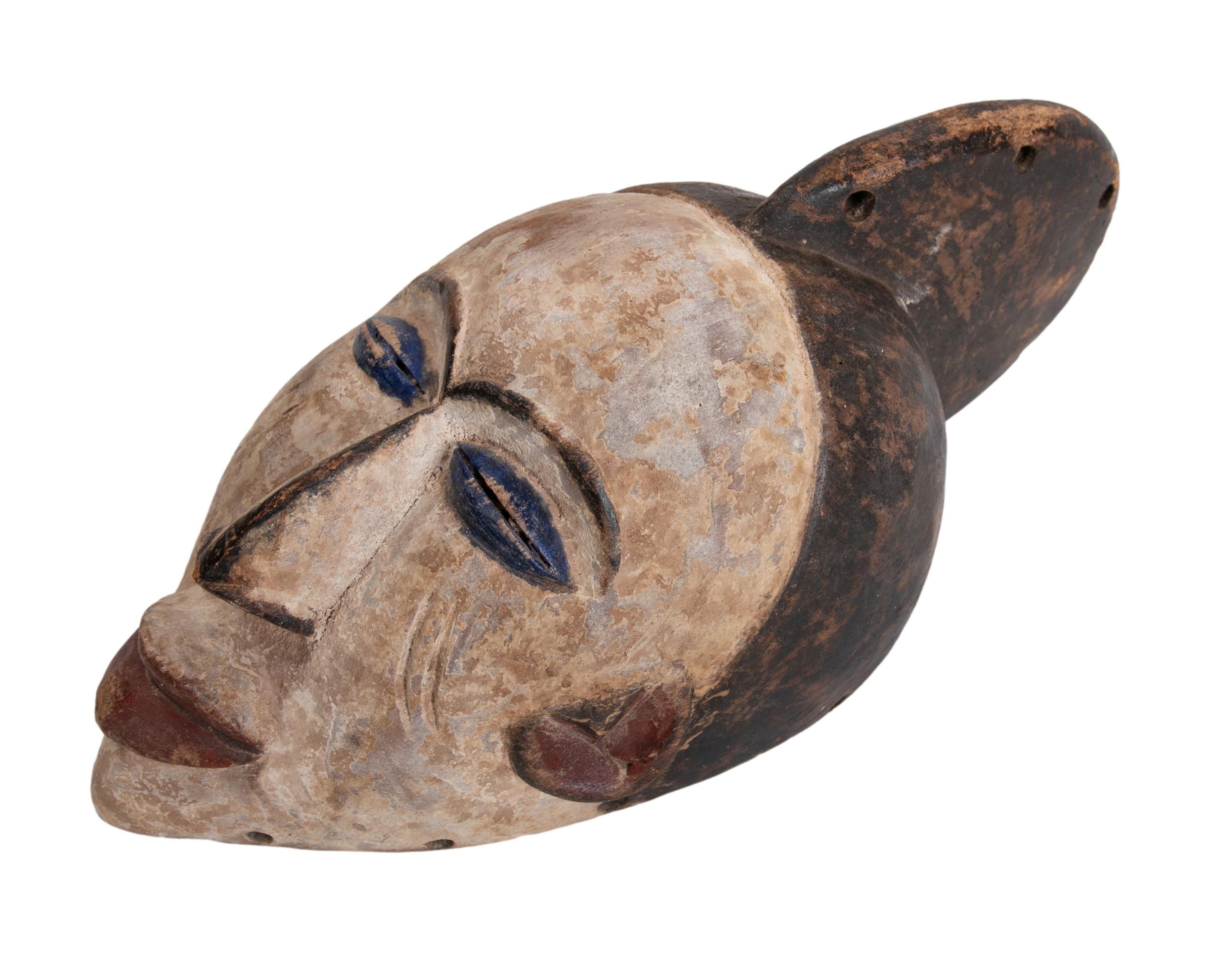 Ethnic 1990s African hand carved wooden 2-tone ceremonial tribal mask.