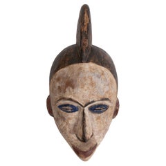 Masque tribal ethnique africain des années 1990 en bois sculpté à la main, 2 tons