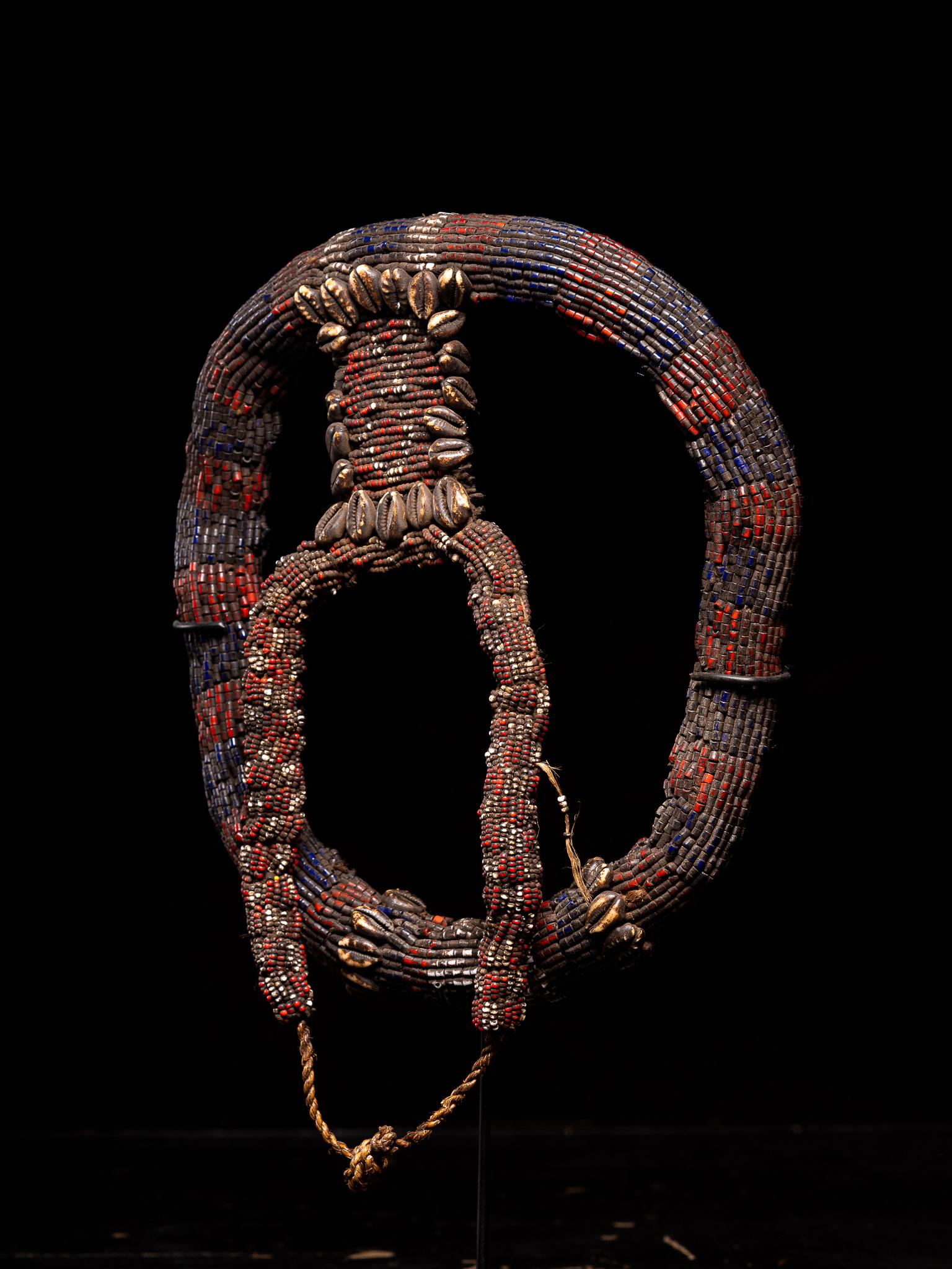 Bamileke beaded Collar or Torque partially decorated with cauris

Private collection Brussels

