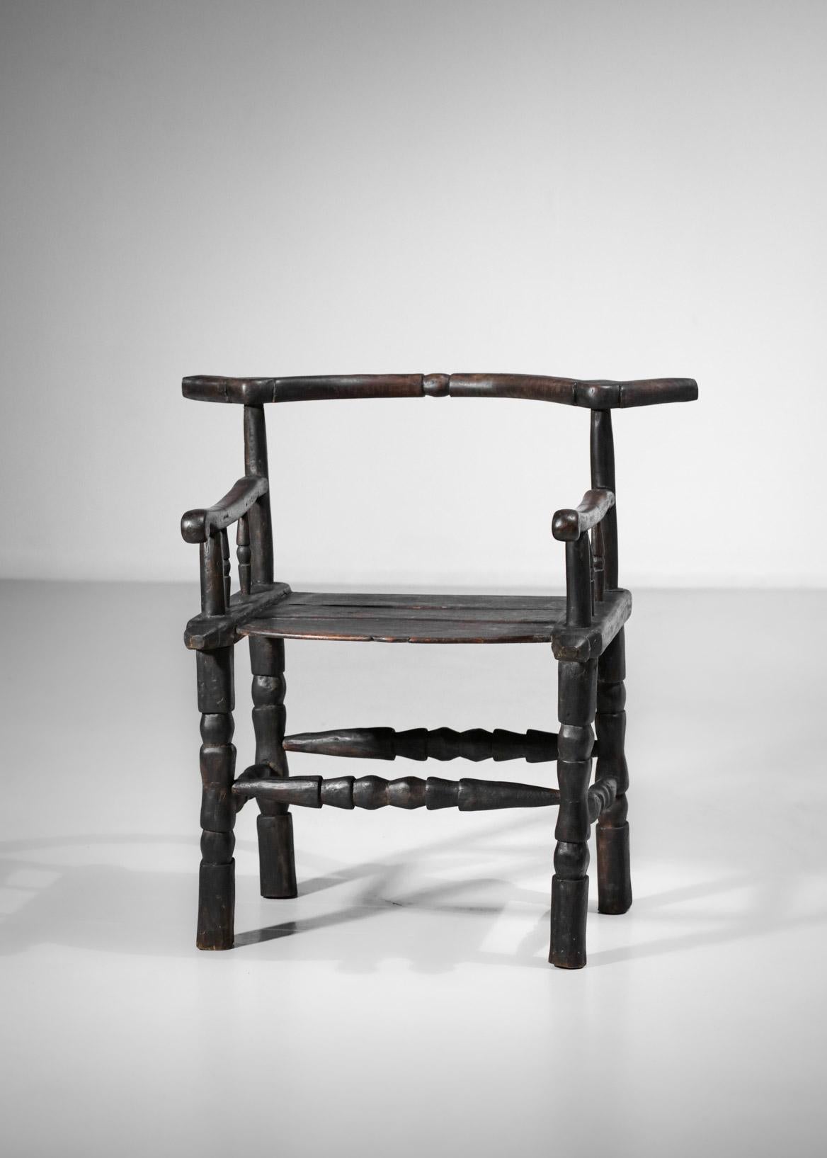 Hand-Carved Ethnic Senoufo Chair in Solid Wood from the 50s African Design Ethnic Armchair For Sale