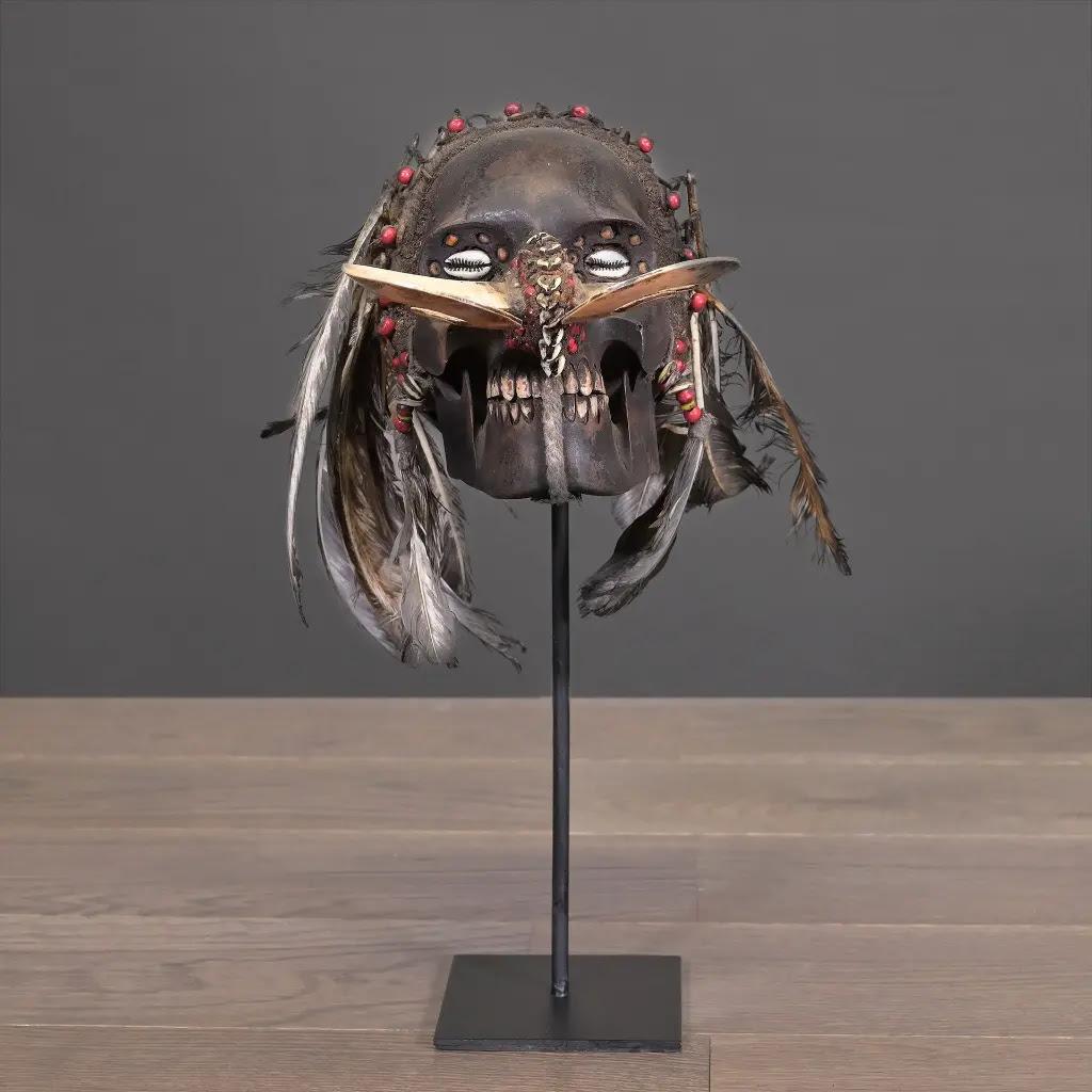 Rustic Ethnic Tribal Trophy Skull Replica in Resin, Feathers & Shells – Irian Jaya Styl For Sale
